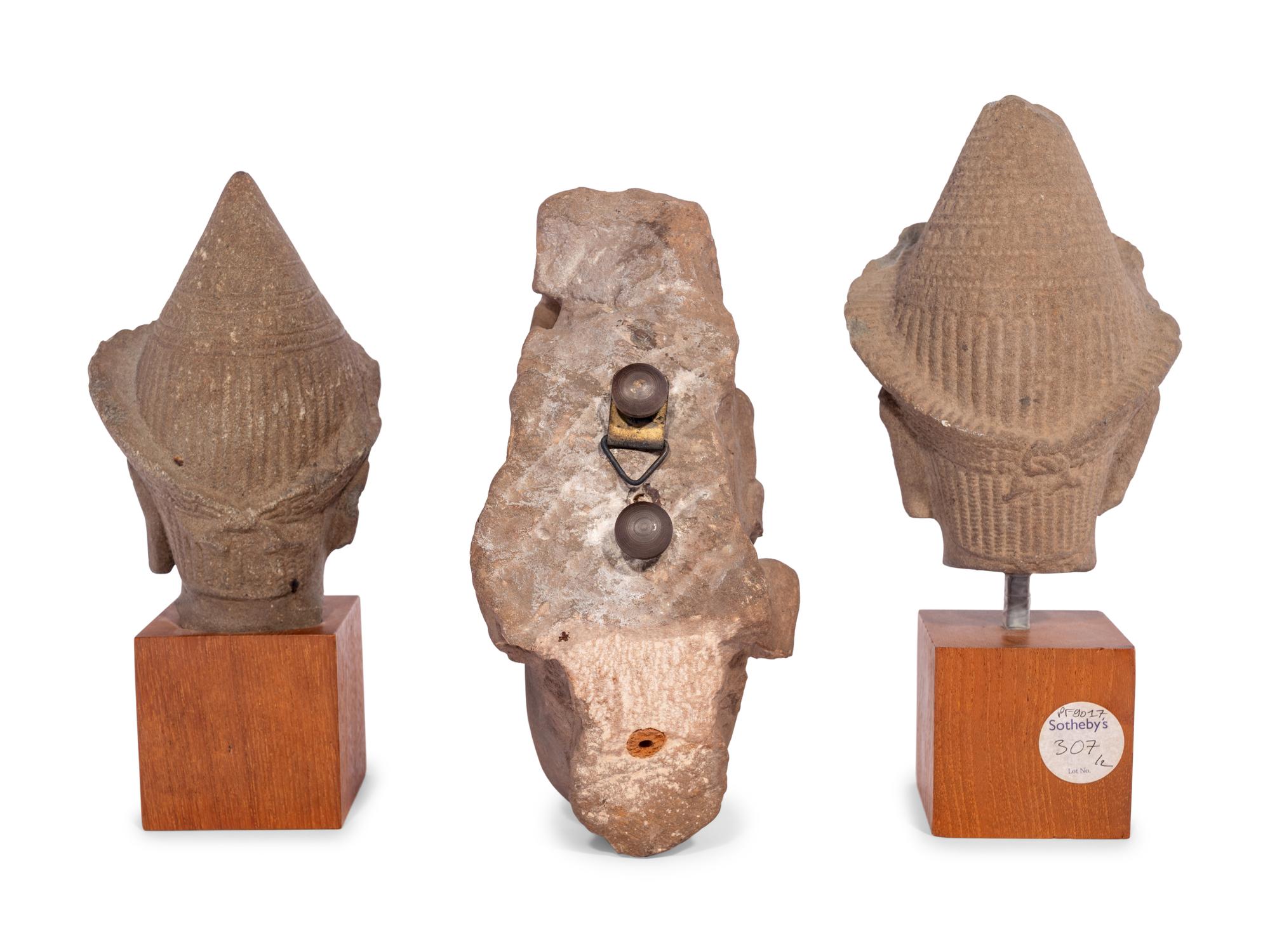 Three Carved Stone Heads of Buddha