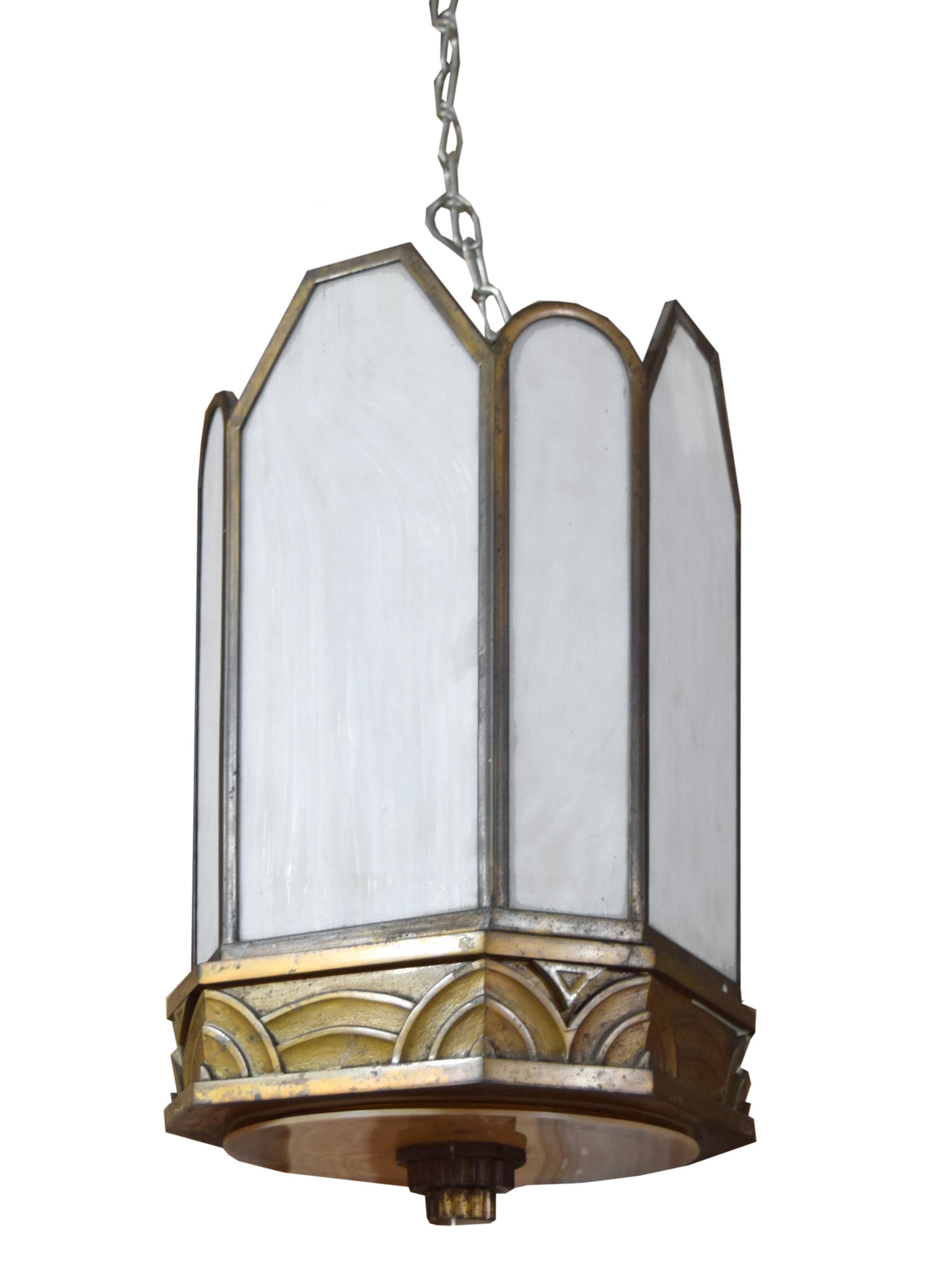 A Pair of Art Deco Bronze Chandeliers 11" W x 11" D x 30.5" H — United States, Circa 1920