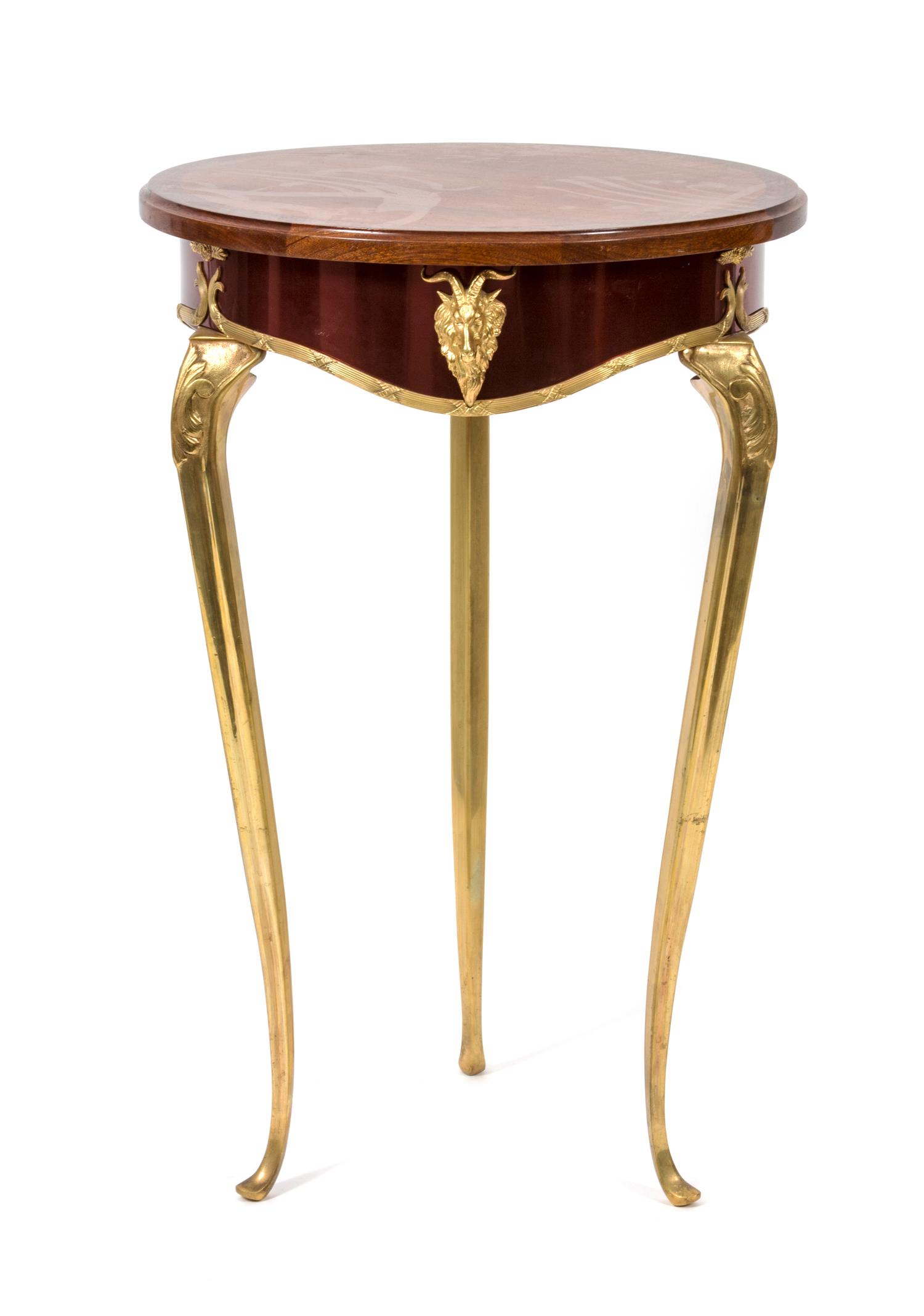 A Louis XVI Style Mahogany Occasional Table Height 31 x diameter 19 3/4 inches. — 20TH CENTURY