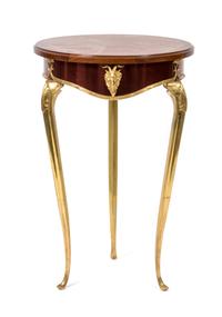 A Louis XVI Style Mahogany Occasional Table Height 31 x diameter 19 3/4 inches. — 20TH CENTURY