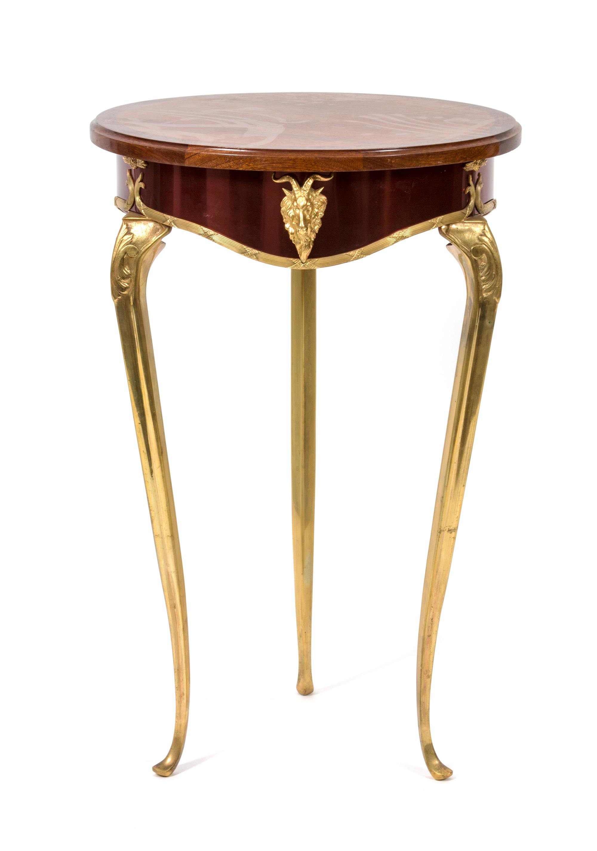 A Louis XVI Style Mahogany Occasional Table Height 31 x diameter 19 3/4 inches. — 20TH CENTURY