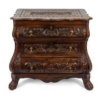 A Dutch Baroque Style Carved Oak Chest of Drawers — 20TH CENTURY