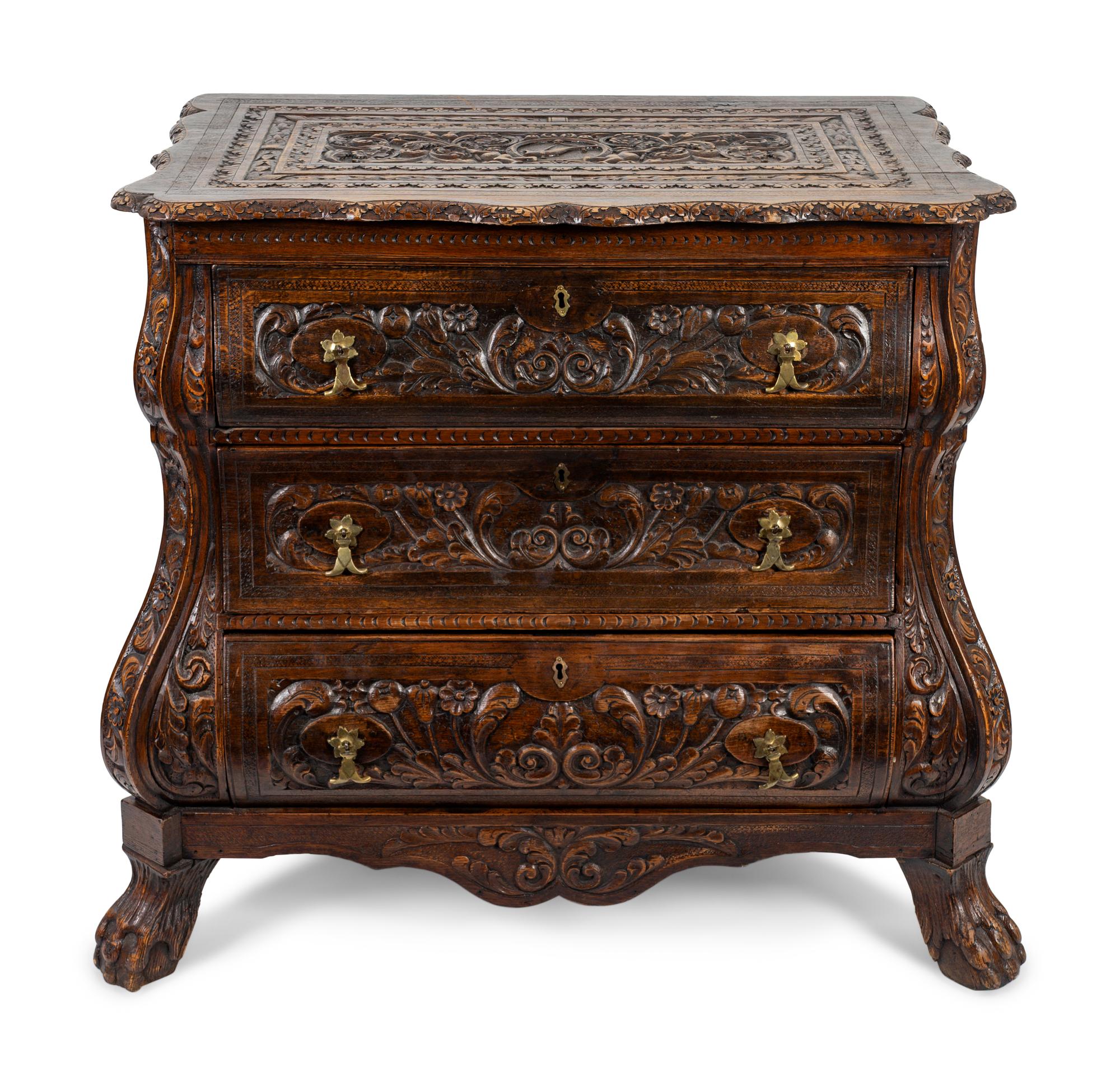 A Dutch Baroque Style Carved Oak Chest of Drawers — 20TH CENTURY