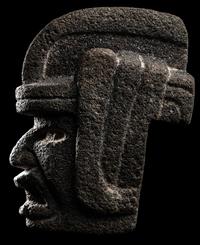 A Veracruz Stone Hacha in the Form of a Warrior