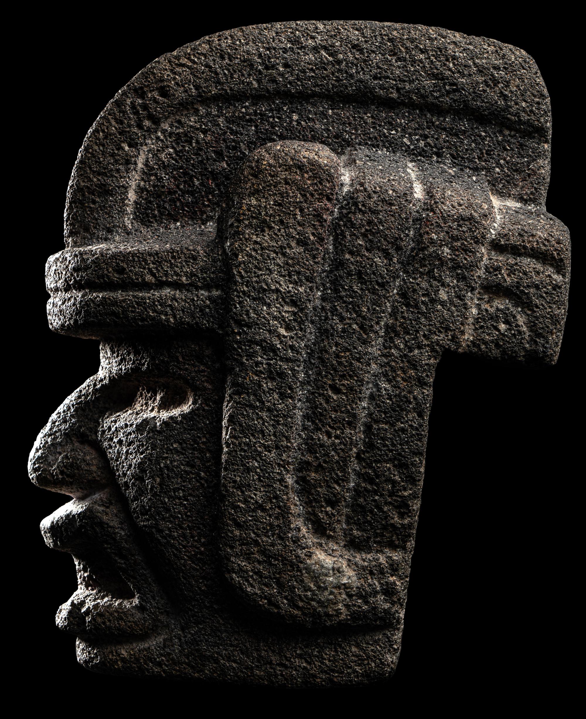 A Veracruz Stone Hacha in the Form of a Warrior