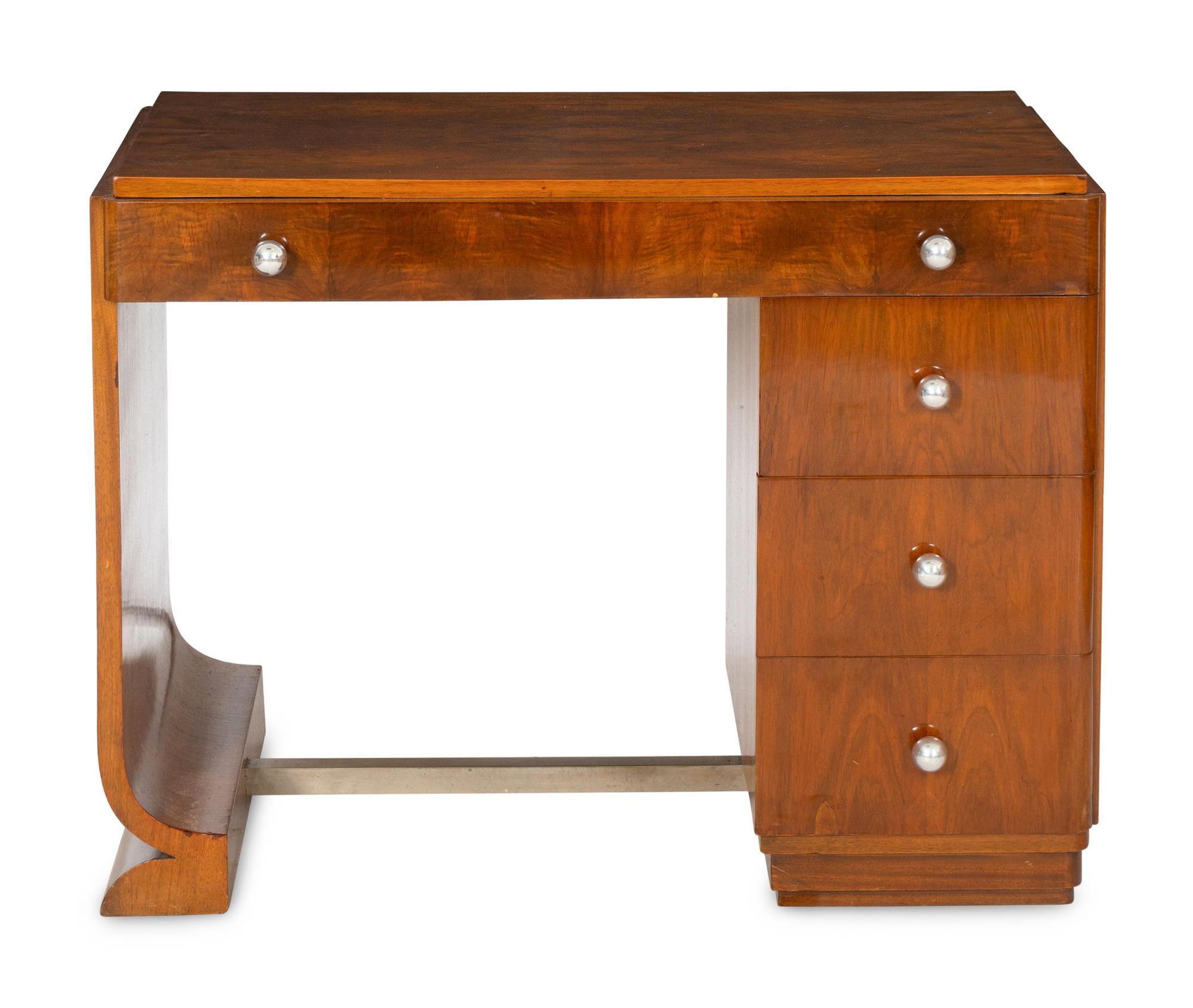 A French Art Deco Figured Walnut Desk