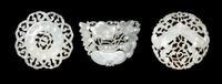 Three Chinese Reticulated White Jade Pendants