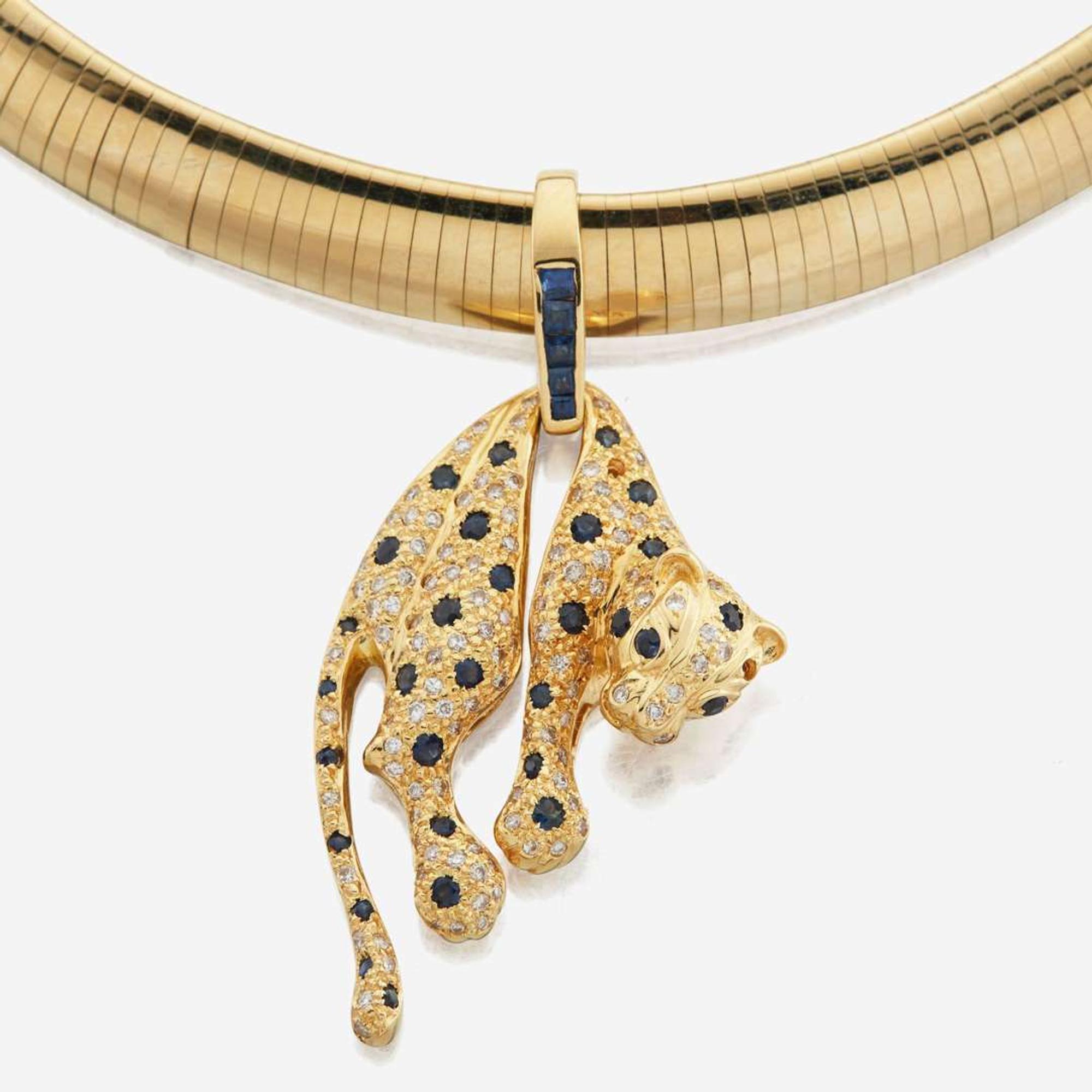 A diamond and sapphire gold necklace