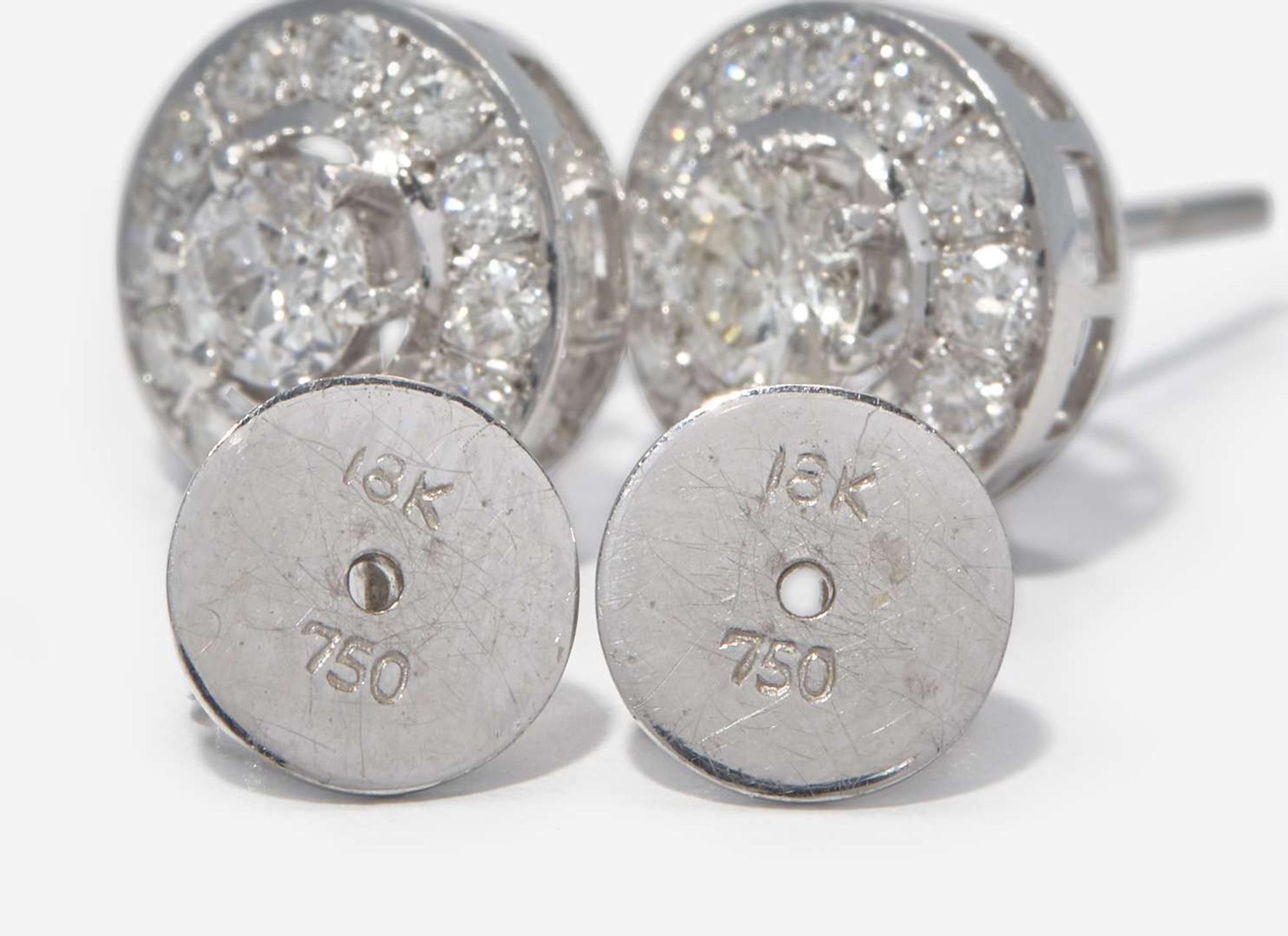 A Pair of 18K White Gold and Diamond Earrings