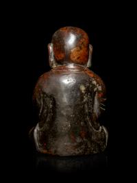 A Small Bronze Figure of a Seated Monk