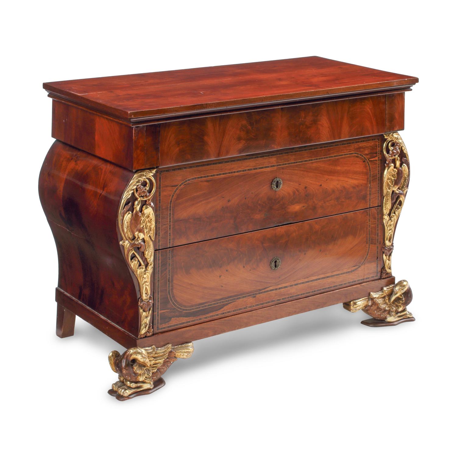 An Italian Parcel-Gilt Mahogany Chest of Drawers
