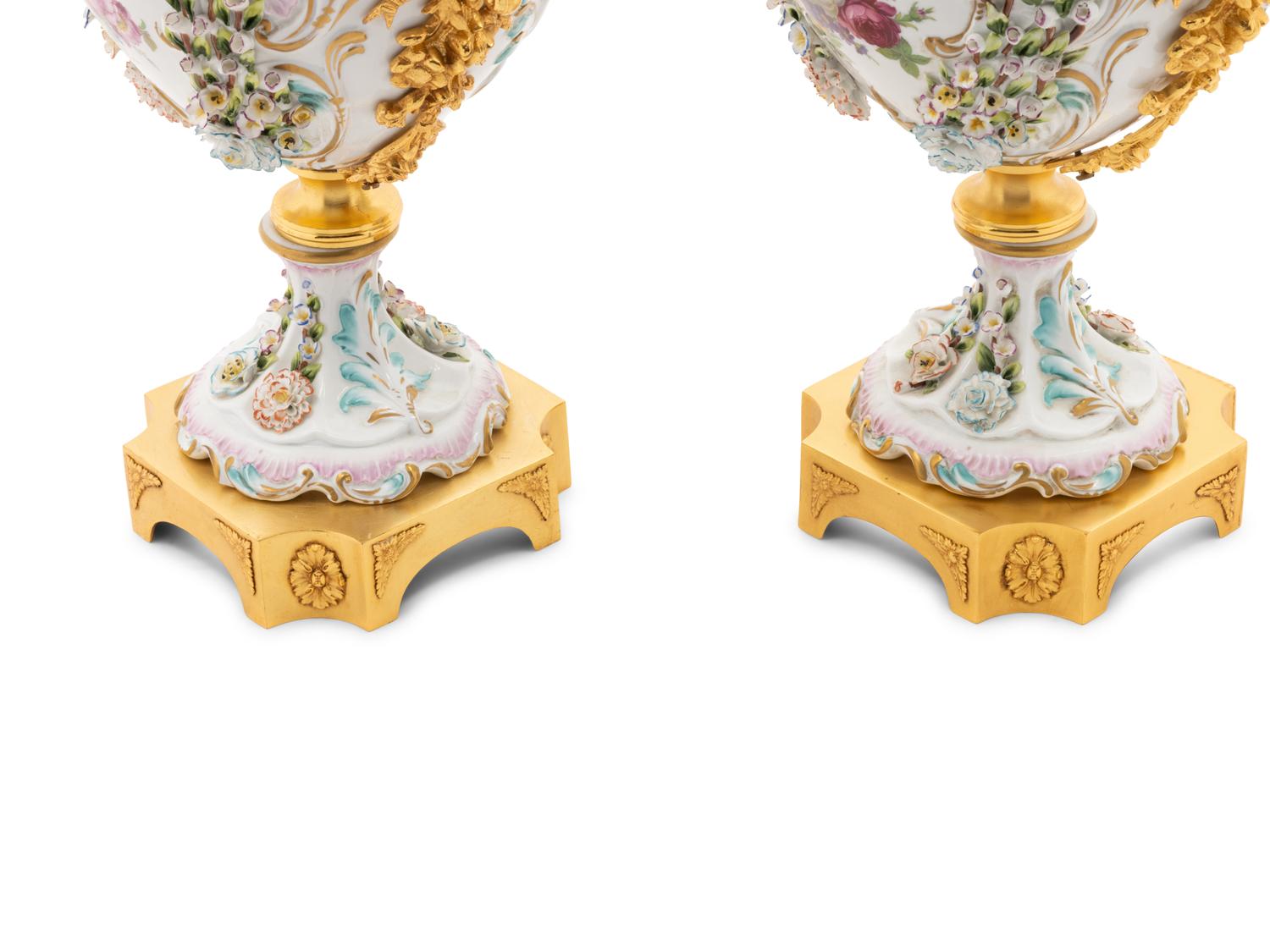 A Pair of Tiche Gilt Metal Mounted Porcelain Urns