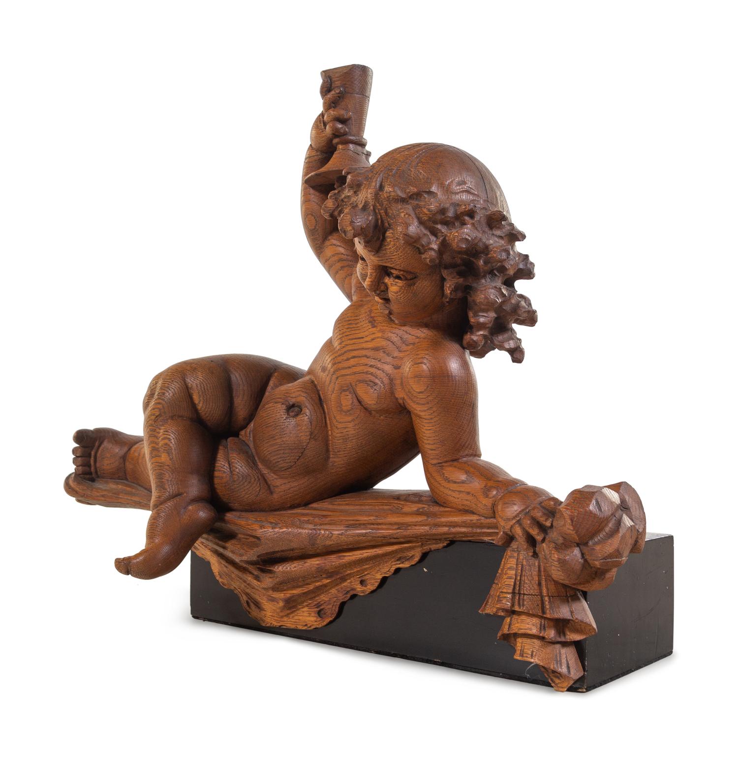 A Continental Carved Oak Figure