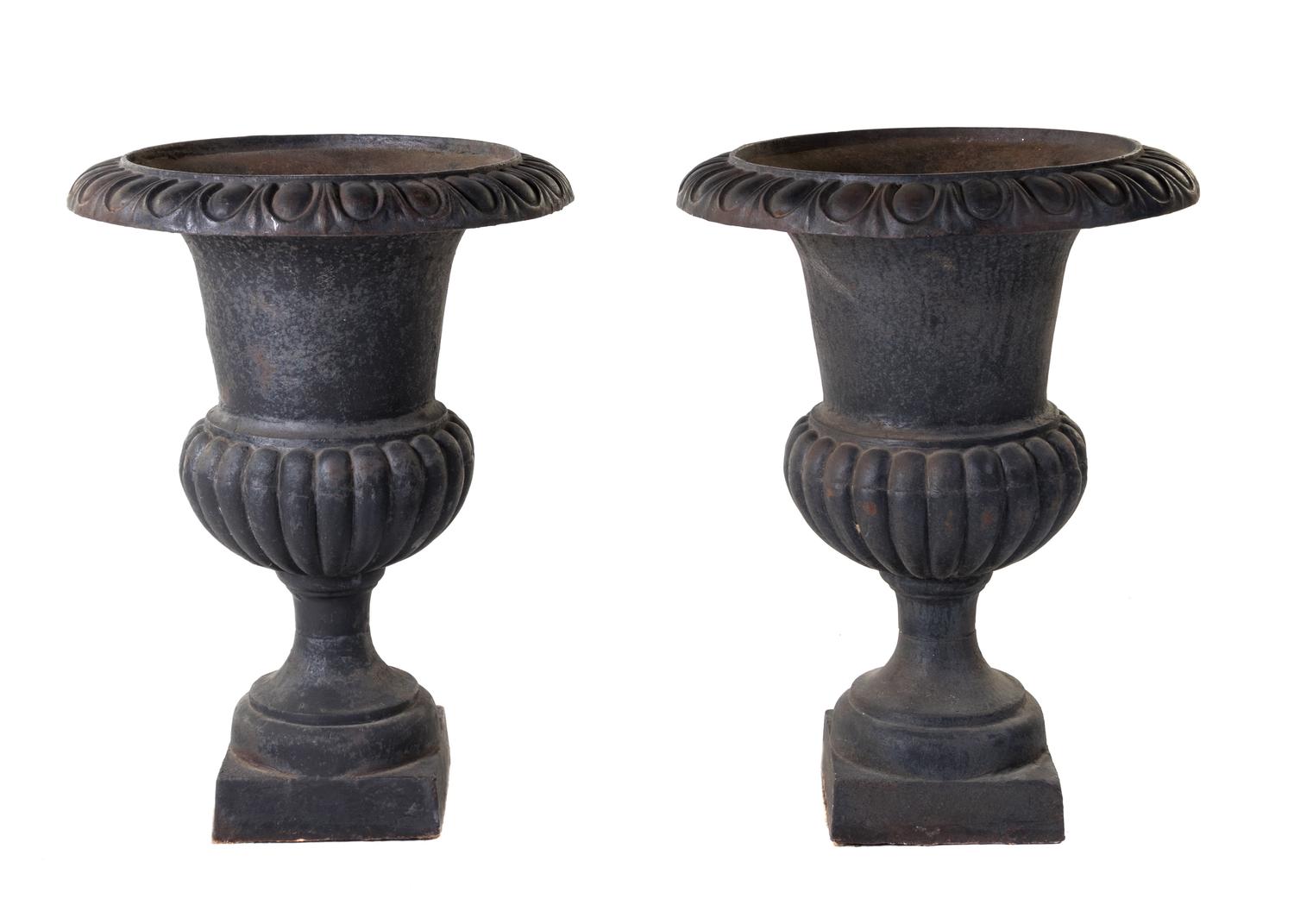 A Pair of Victorian Style Cast Iron Urns Height 31 inches. — EARLY 20TH CENTURY