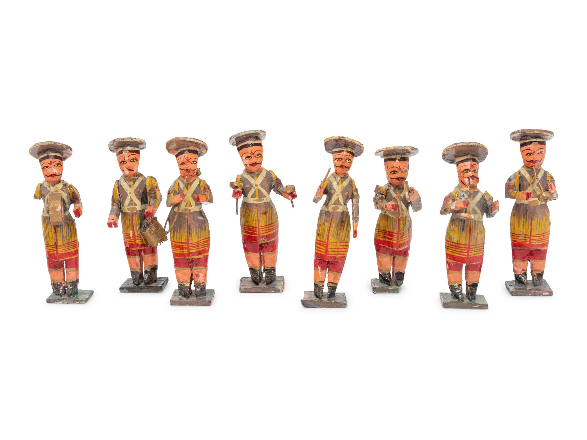 Eight Russian Polychromed Carved Wood Marchind Band Figures