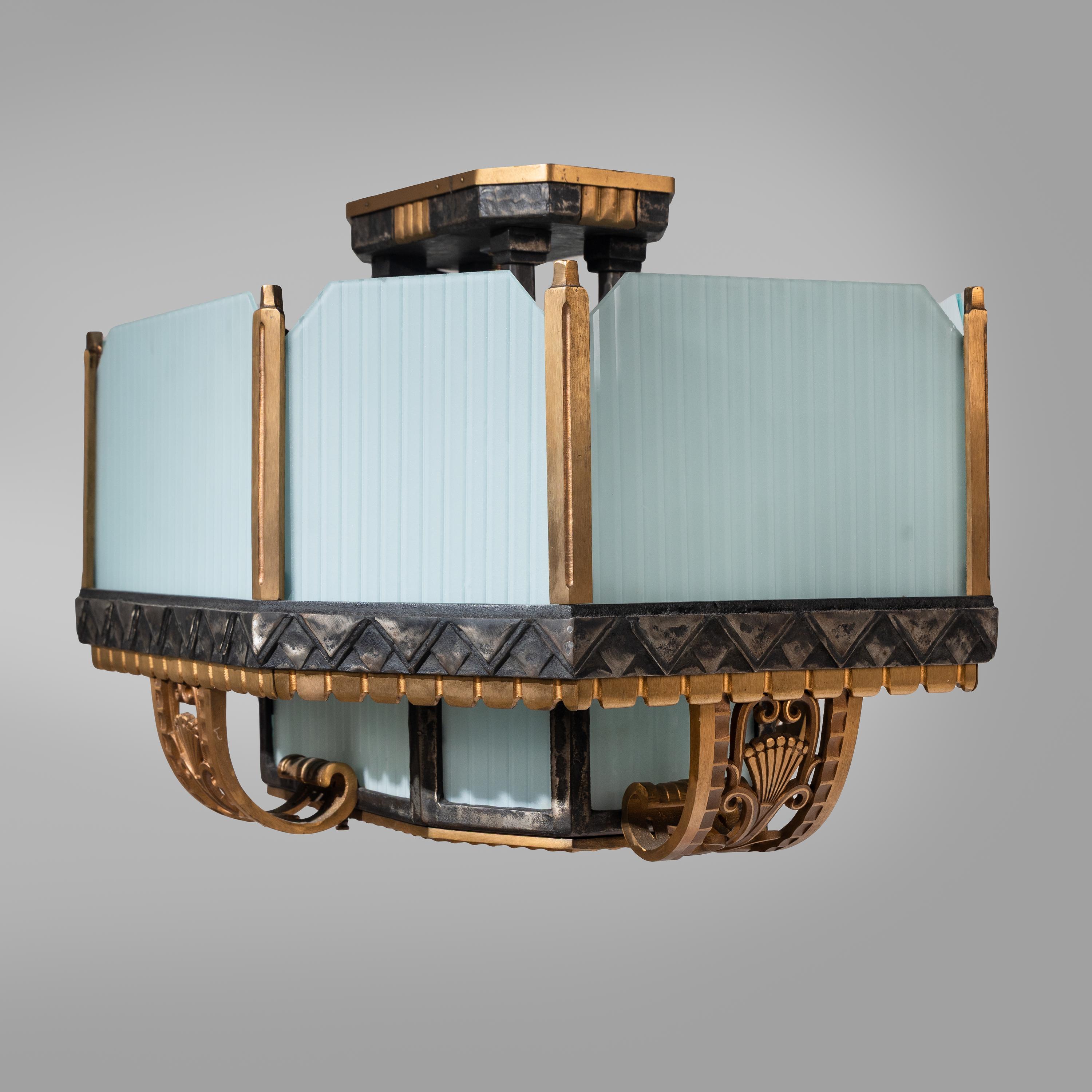 Art Deco Chicago, c. 1929 — Pair of Bronze and Glass Lighting Fixtures