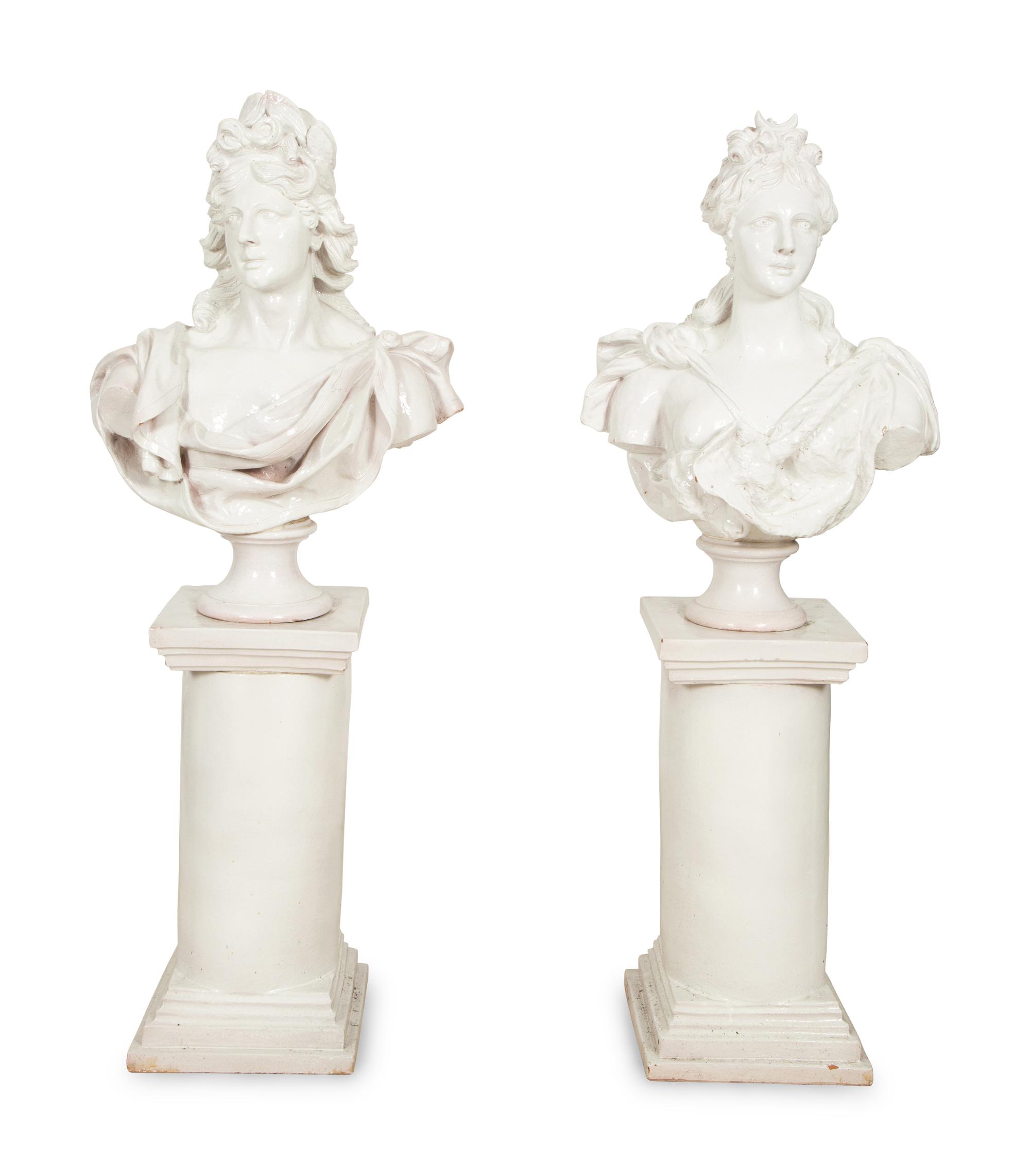 A Pair of Italian White Glazed Ceramic Busts on Pedestal Bases
