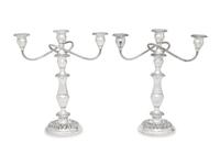 A Pair of American Silver Repoussé Three-Light Candelabra