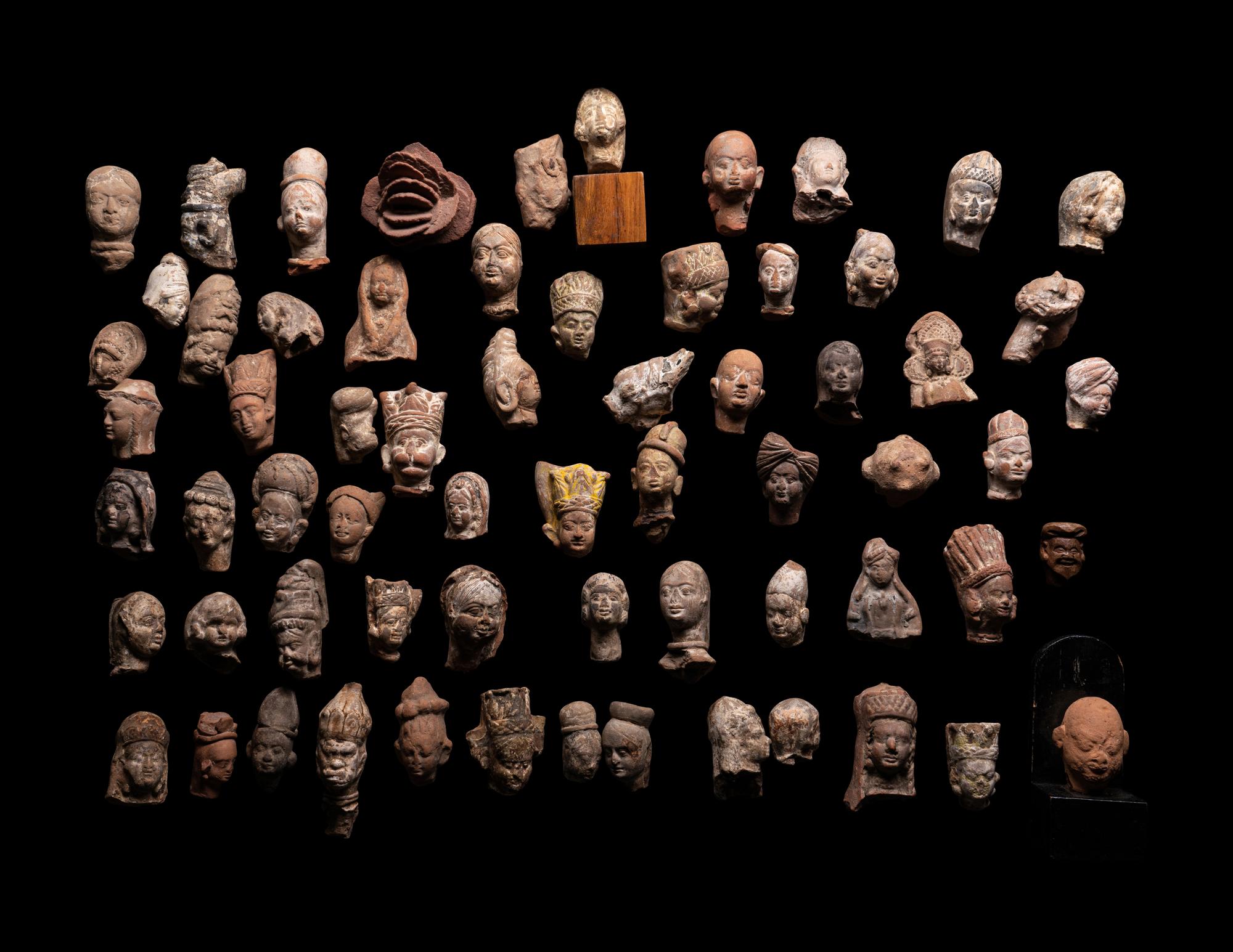 A Group of 65 Gandharan Terracotta Heads