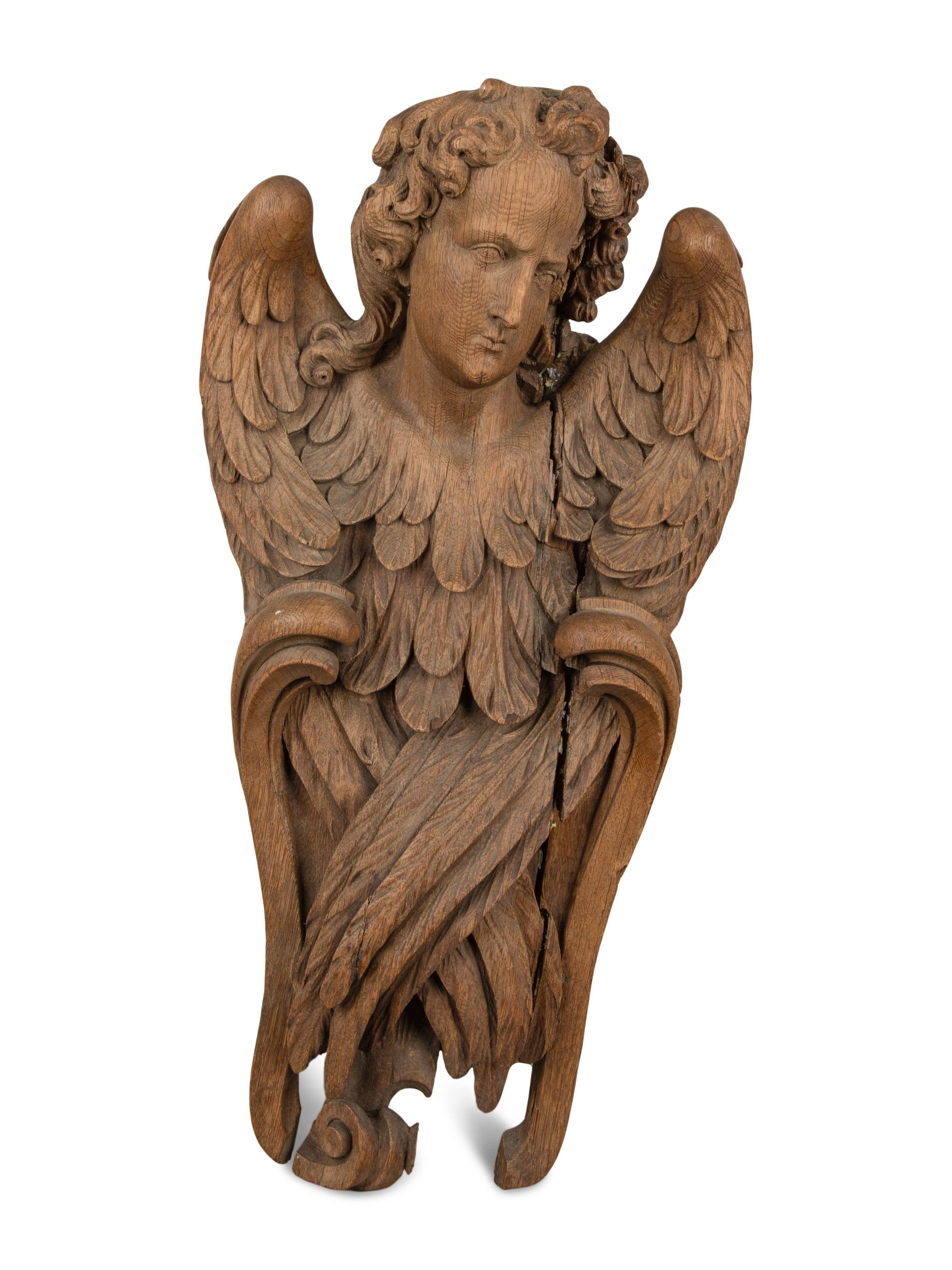 A Pair of Continental Oak Figural Pilasters — 17TH CENTURY