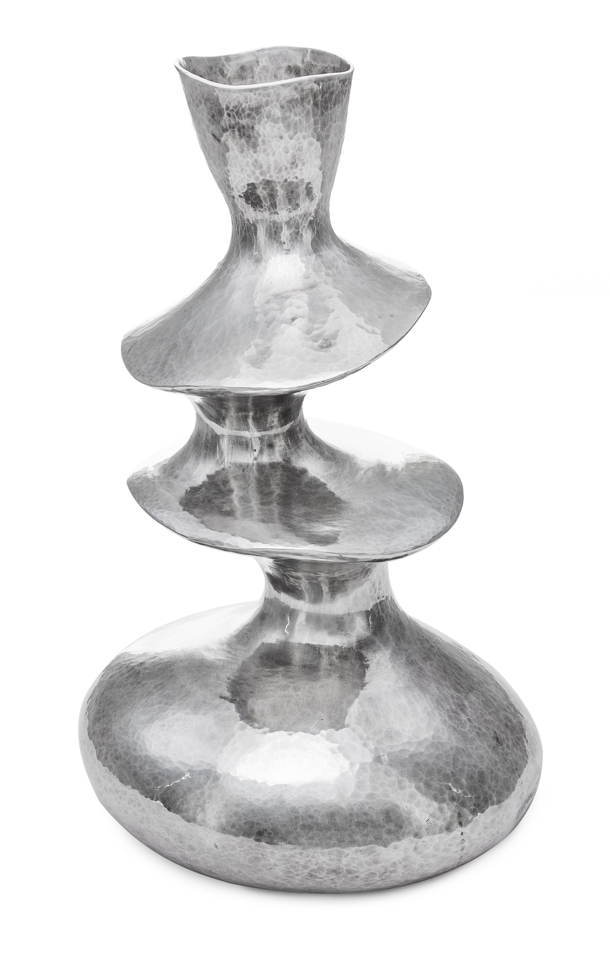 A Contemporary English Silver Vase, Hiroshi Suzuki, Sheffield, 2002, of three tiered from with a spot-hammered finish throughout.