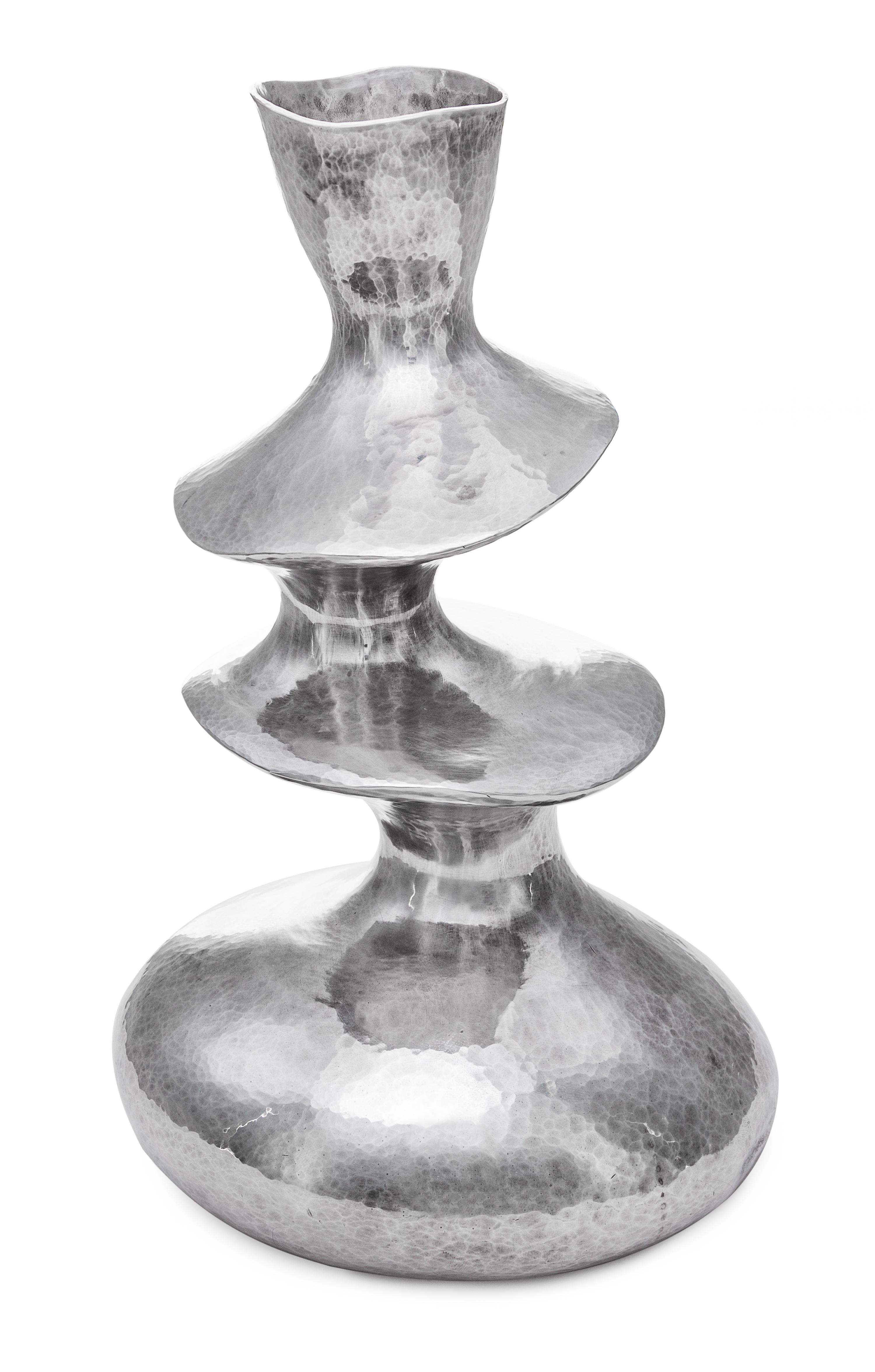 A Contemporary English Silver Vase, Hiroshi Suzuki, Sheffield, 2002, of three tiered from with a spot-hammered finish throughout.