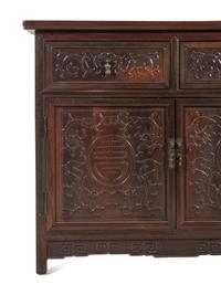 A Chinese Export Carved Hardwood Console Cabinet