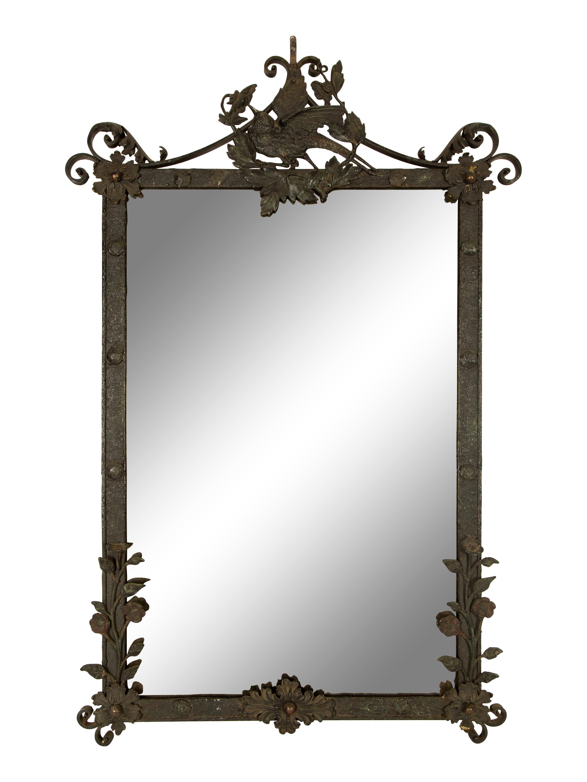 A Wrought Iron Framed Mirror