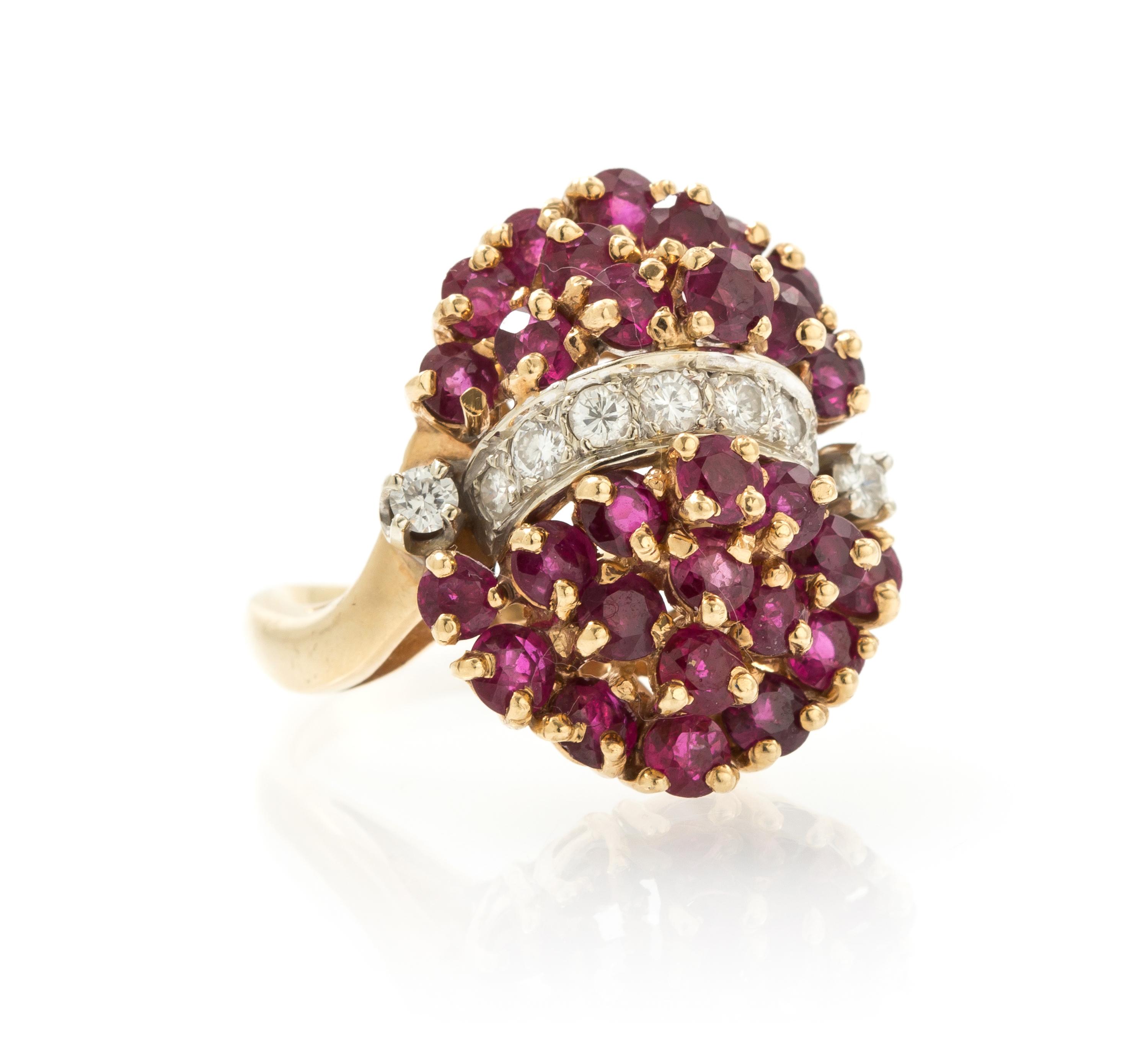 A 14 Karat Yellow Gold, Ruby and Diamond Cluster Ring, 6.70 dwts.