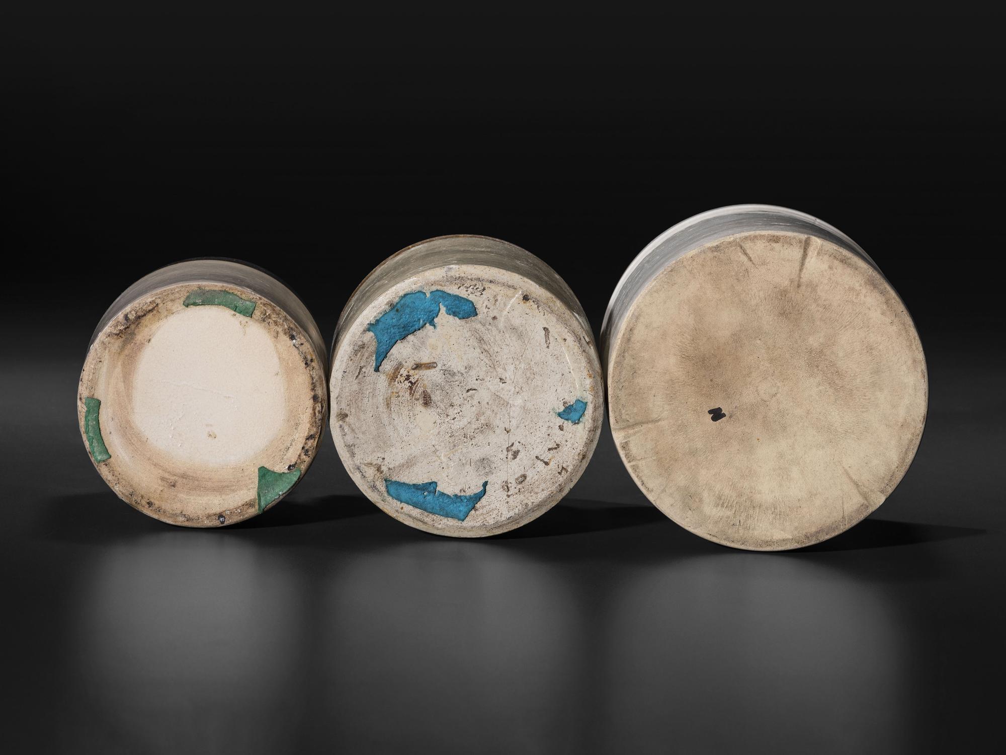Sixteen Stoneware Vessels