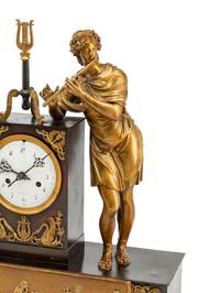 A Louis Philippe Gilt and Patinated Bronze Figural Mantel Clock