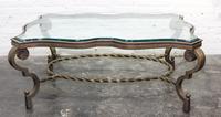 A Wrought Iron and Glass Low Table Height 19 5/8 x width 50 1/2 x depth 22 3/4 inches. — 20TH CENTURY