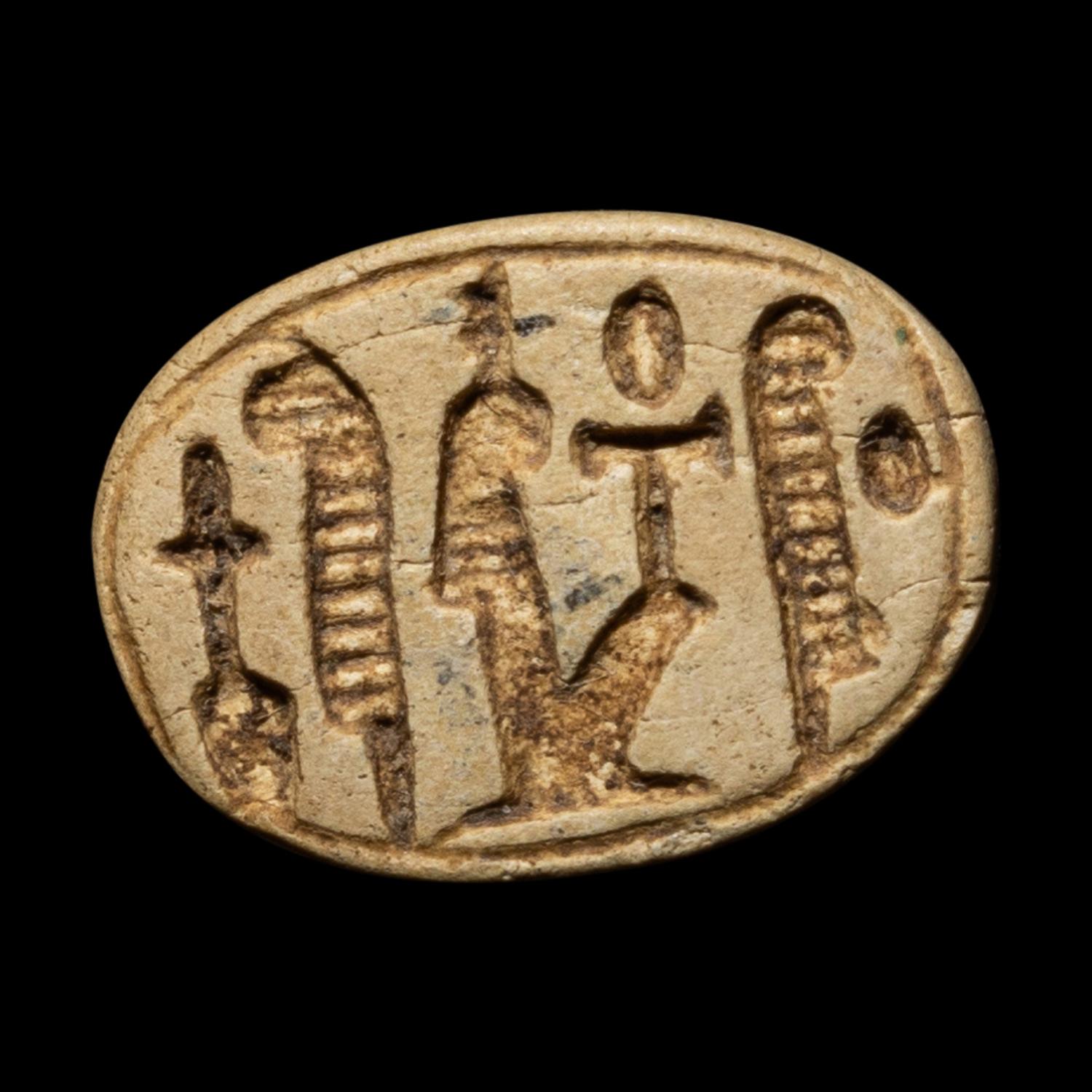 An Egyptian Faience Scarab