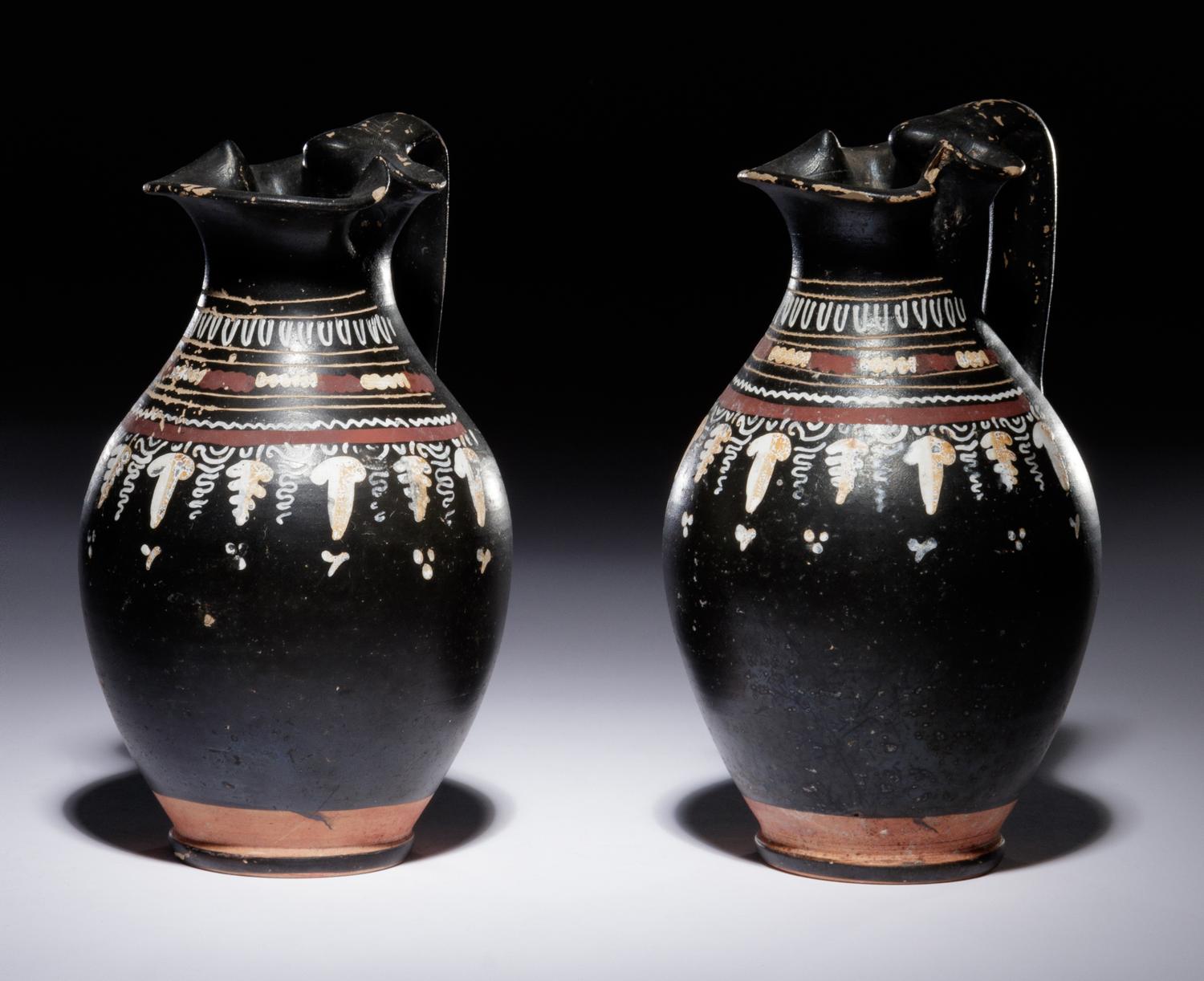 A Pair of Apulian Gnathian Ware Trefoil Oinochoai
