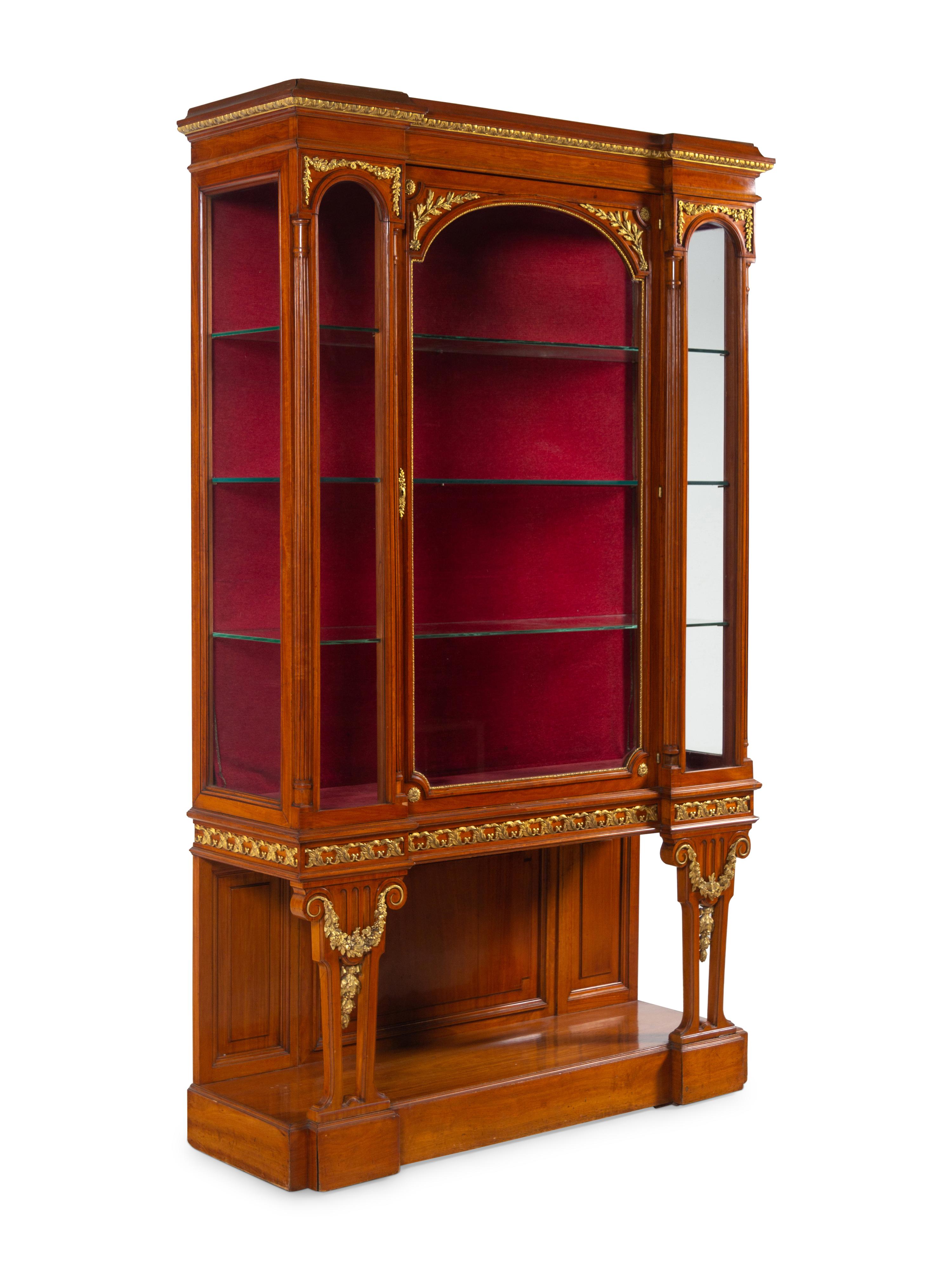 A Pair of Louis XVI Style Gilt Bronze and Metal Mounted Walnut Vitrine Cabinets