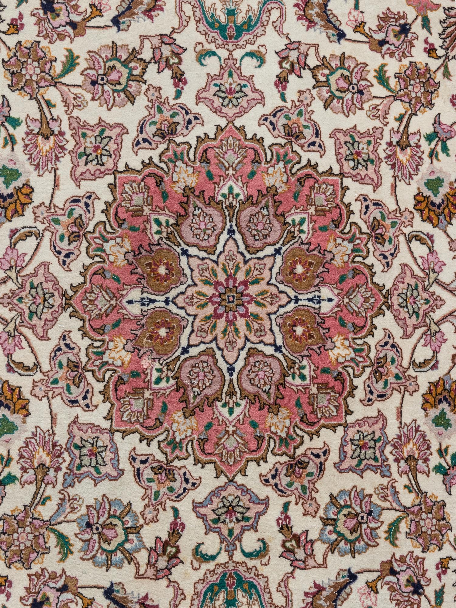 A Tabriz Wool Rug