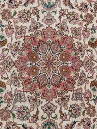 A Tabriz Wool Rug