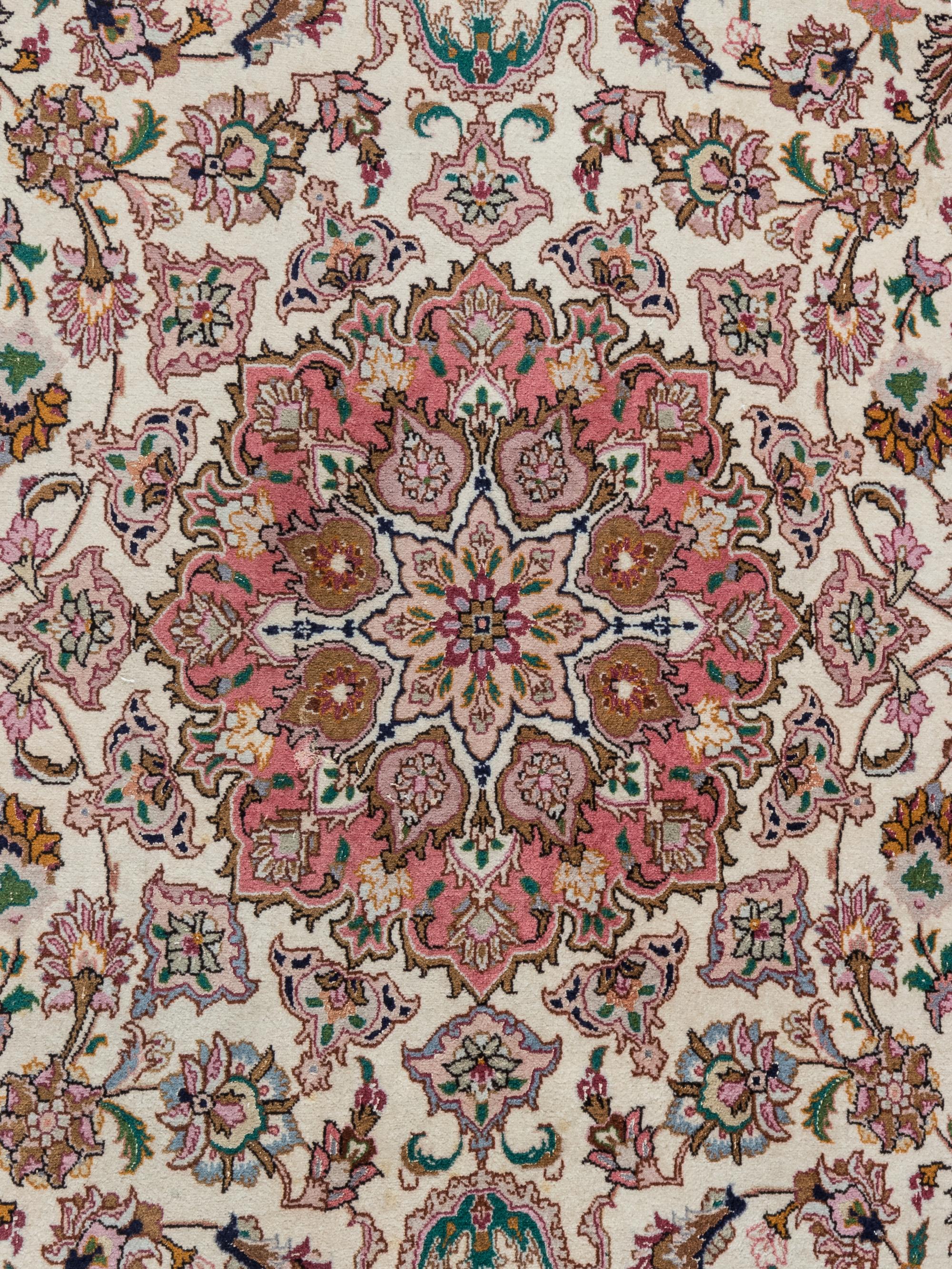 A Tabriz Wool Rug