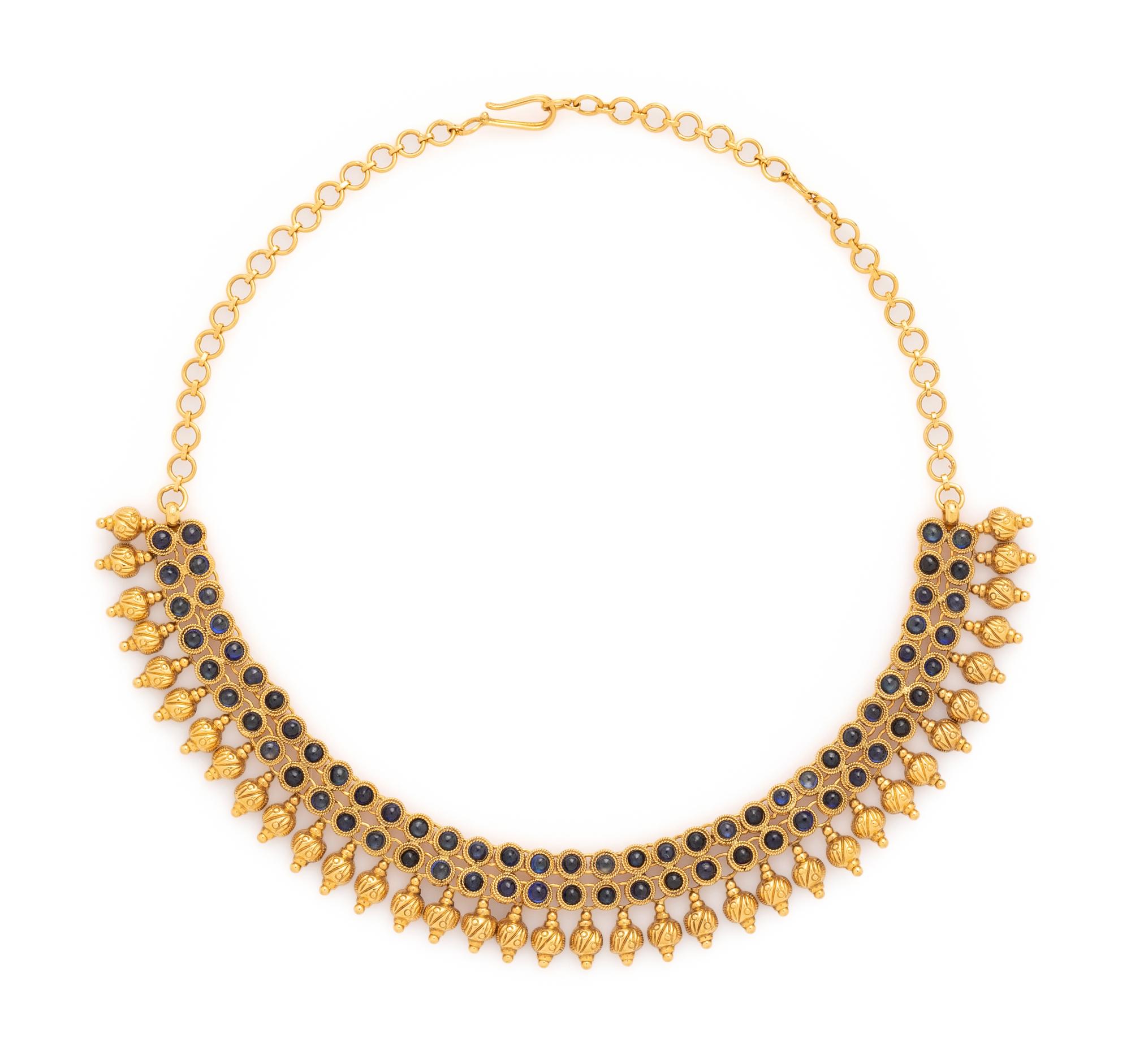 HIGH KARAT GOLD AND BLUE STONE NECKLACE