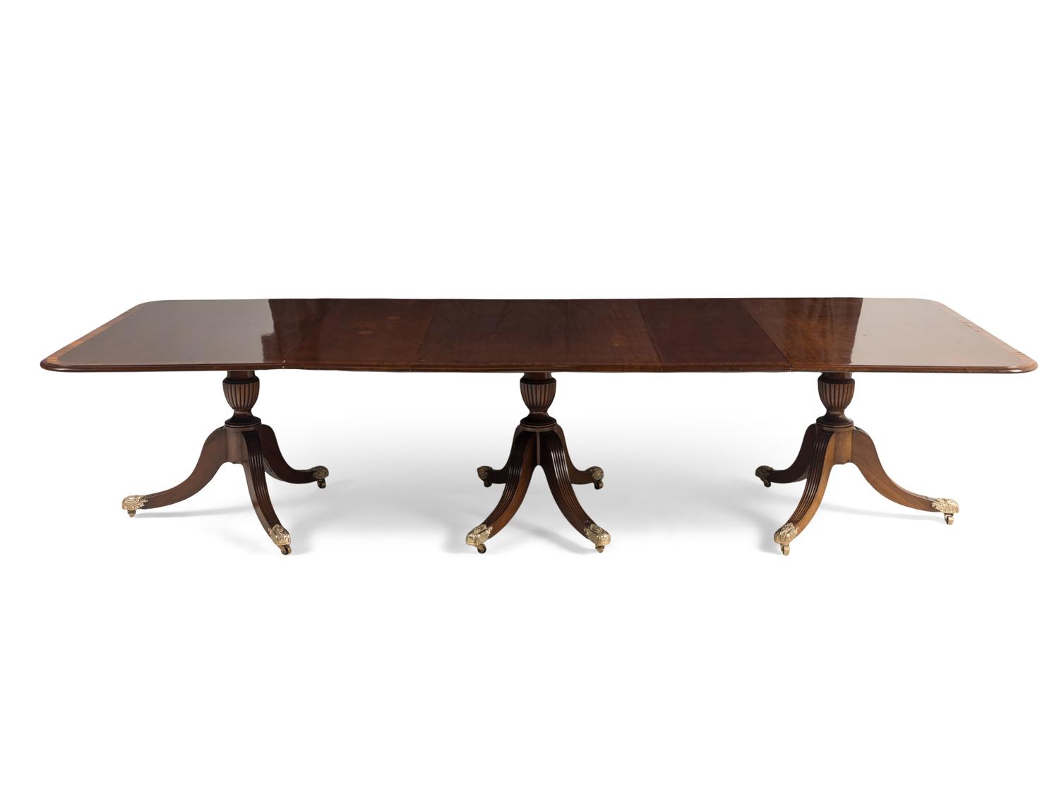 A George III Style Mahogany Triple-Pedestal Dining Table