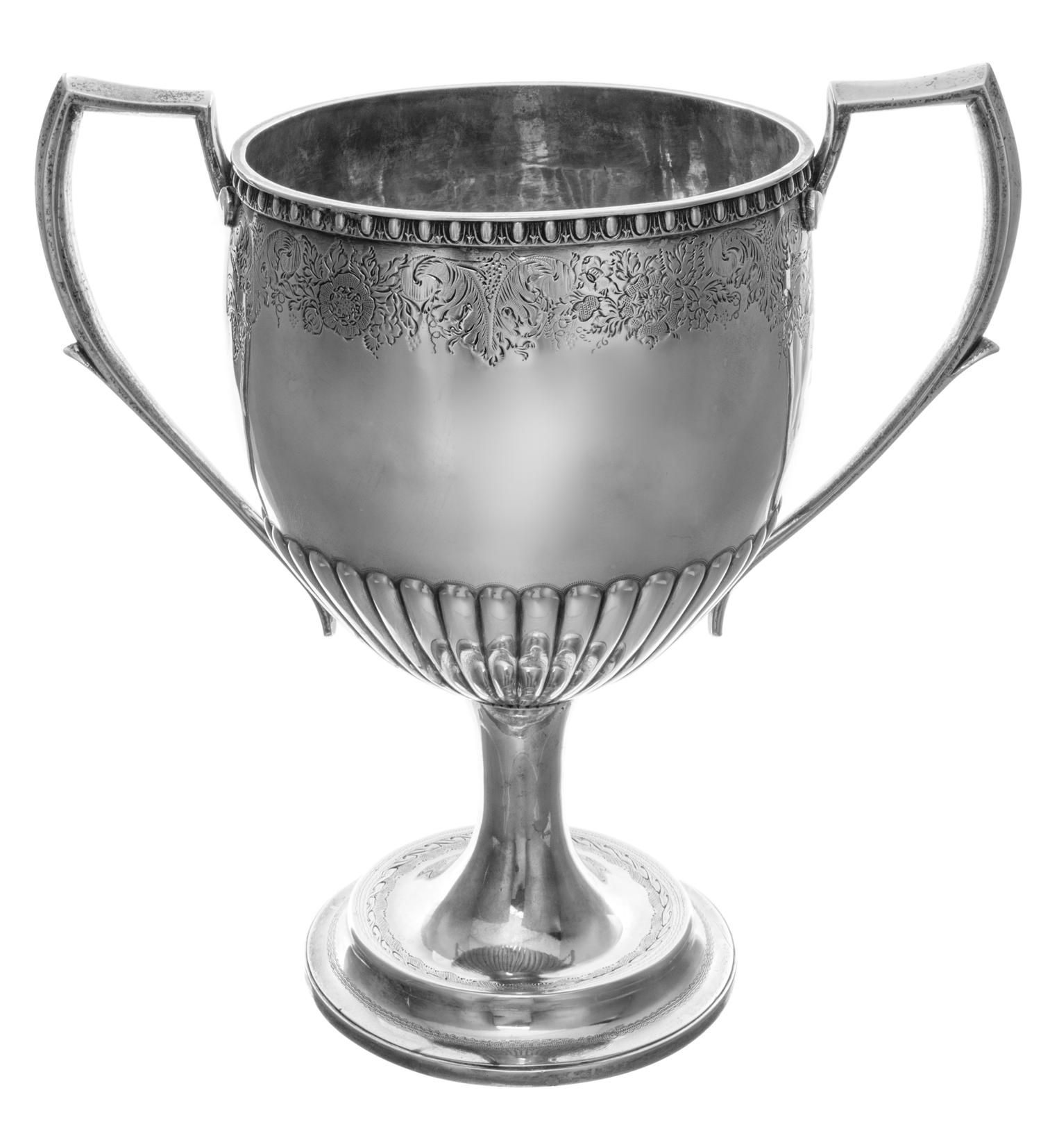 A George III Brittania Silver Trophy, Charles Marsh, Dublin, 1819, the body engraved with a floral and foliate band above a lobed botto