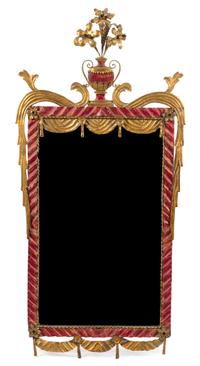 An Italian Tole Mirror Height 53 1/2 x width 25 3/4 inches.
