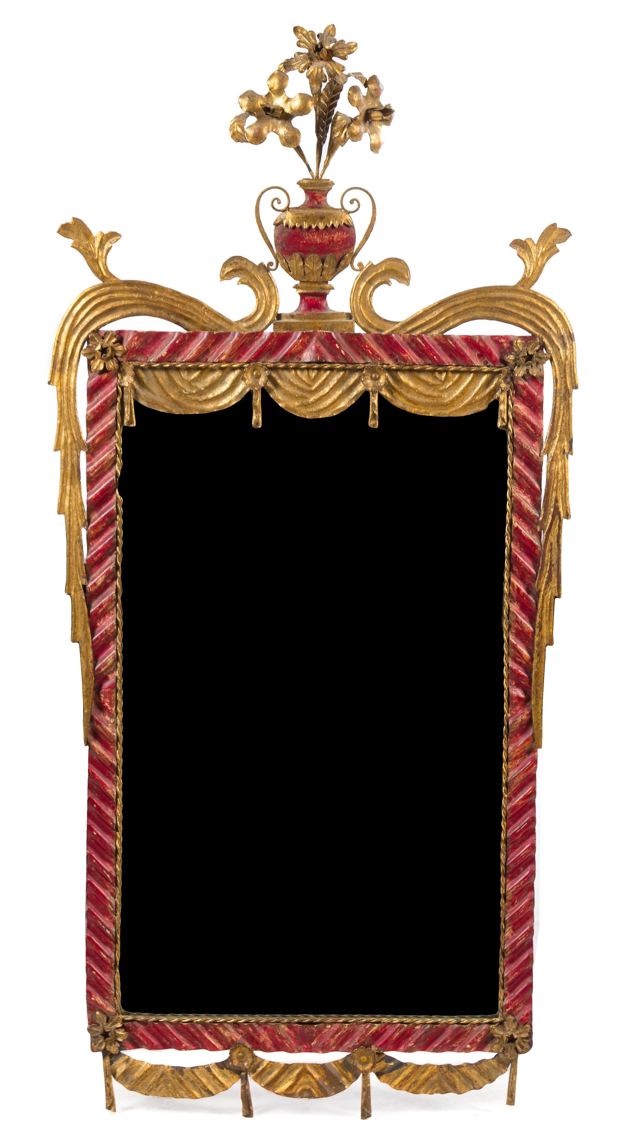 An Italian Tole Mirror Height 53 1/2 x width 25 3/4 inches.