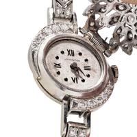 HAMILTON, 14K WHITE GOLD AND DIAMOND SURPRISE WATCH