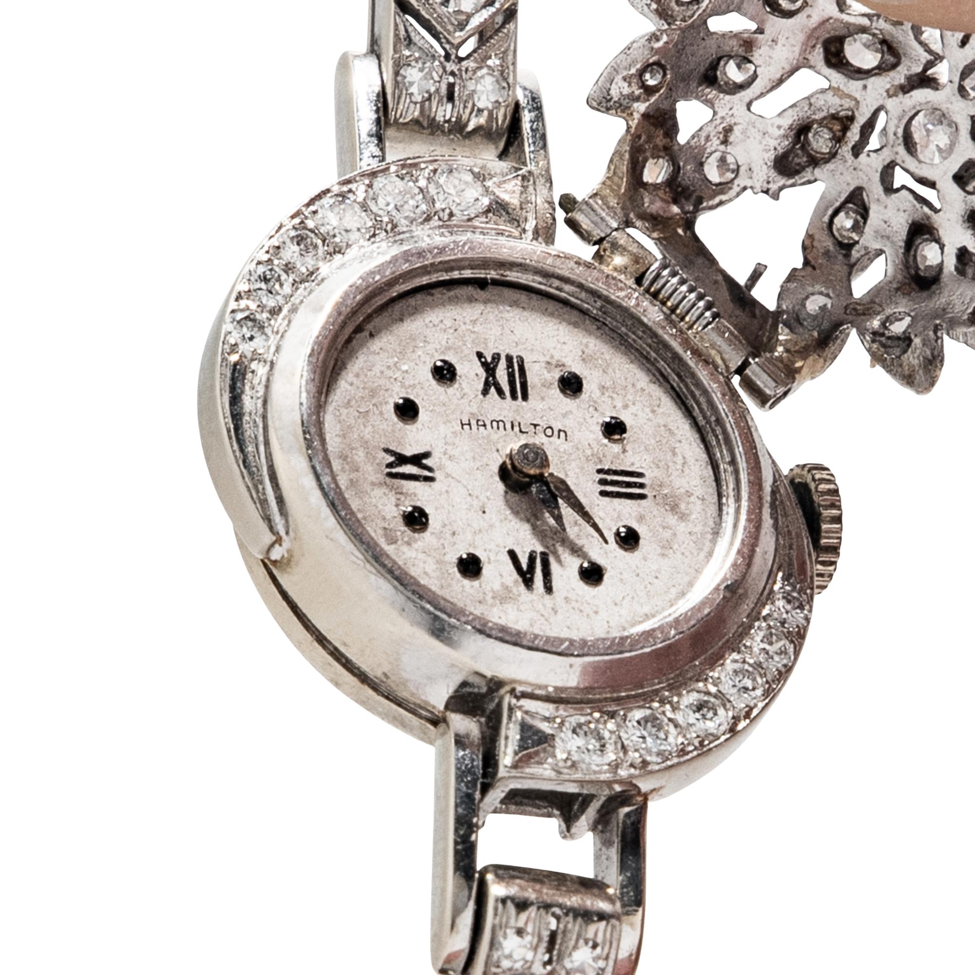 HAMILTON, 14K WHITE GOLD AND DIAMOND SURPRISE WATCH