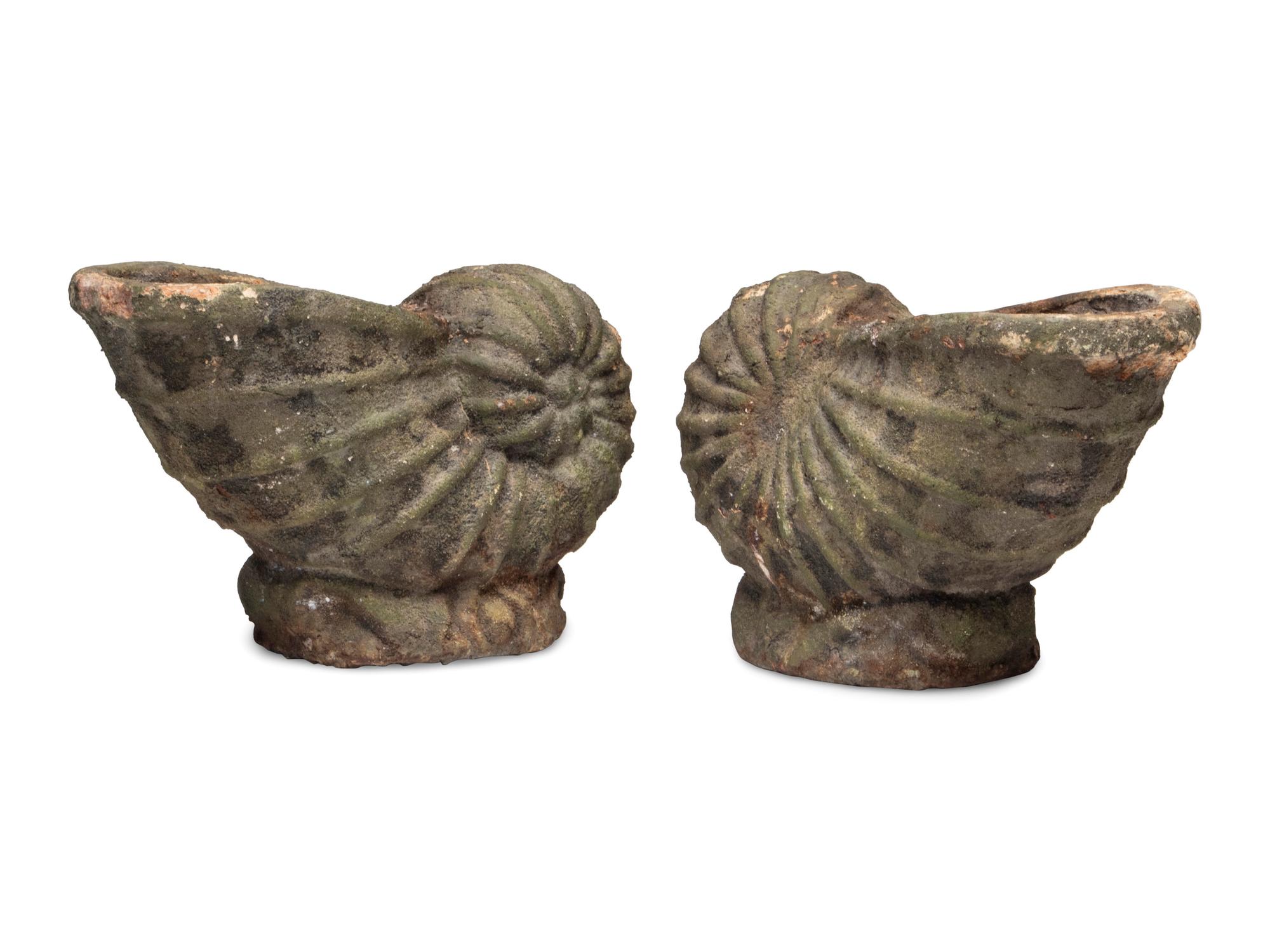 A Pair of Cast Stone Nautilus Jardinières