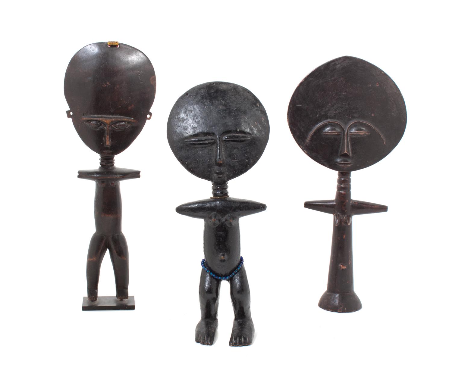 Three Carved Wood African Figures Height of tallest 15 1/2 inches.