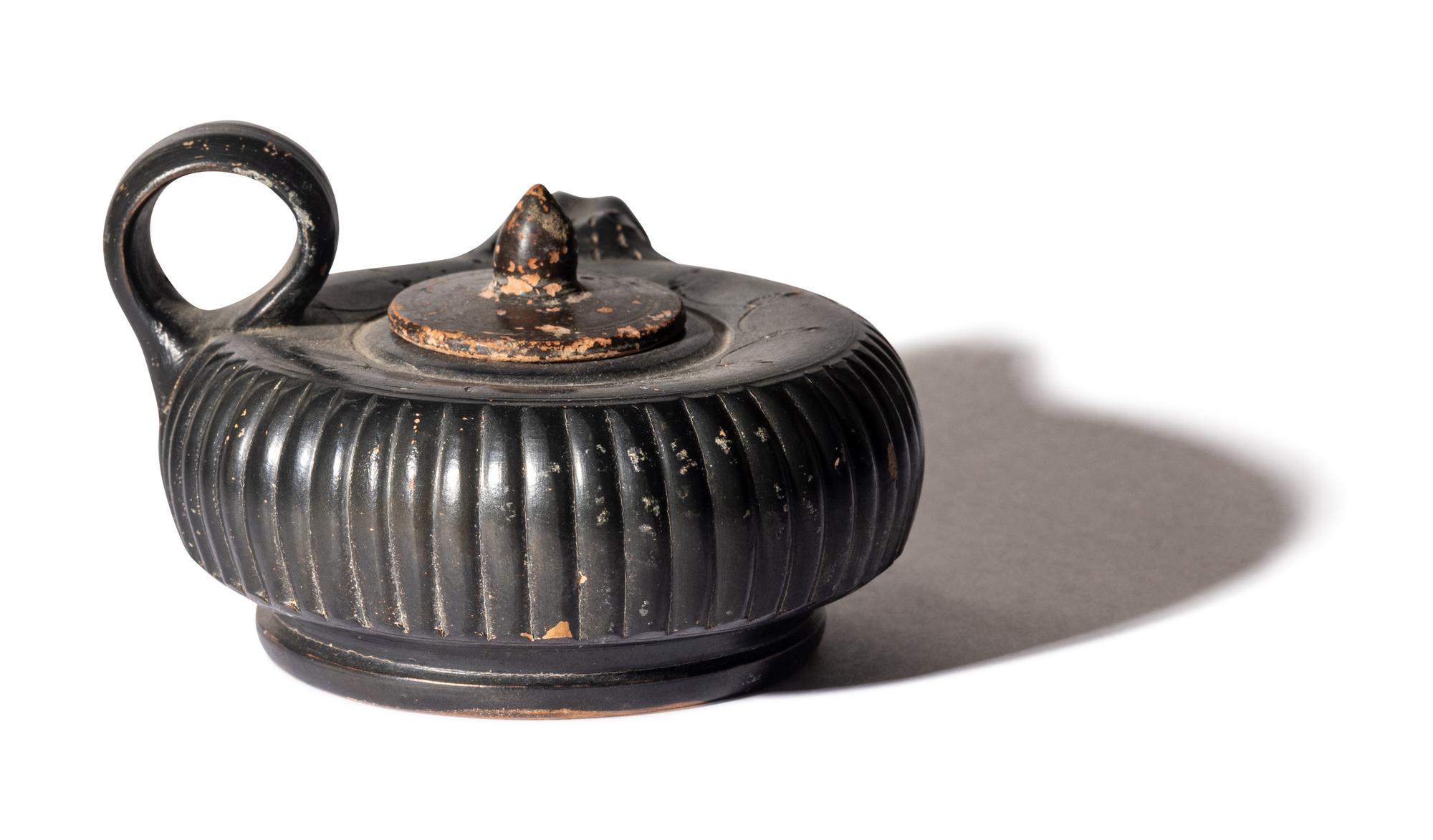 A Greek Black-Glazed Guttus