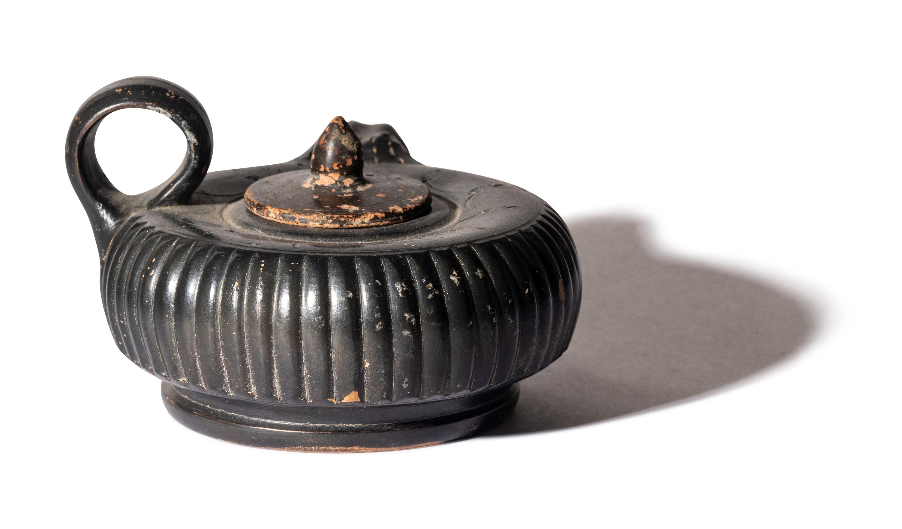 A Greek Black-Glazed Guttus