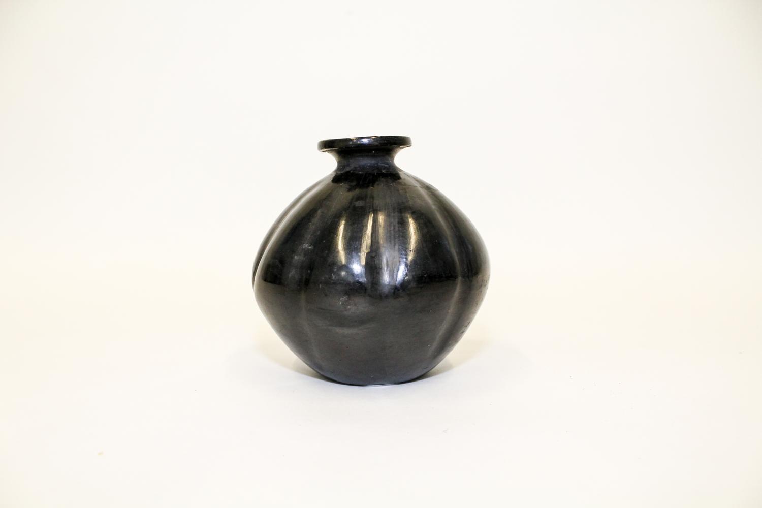 A Blackware Pottery Vase, Dona Rosa, Oaxaca, Mexico Height 5 1/2 inches.